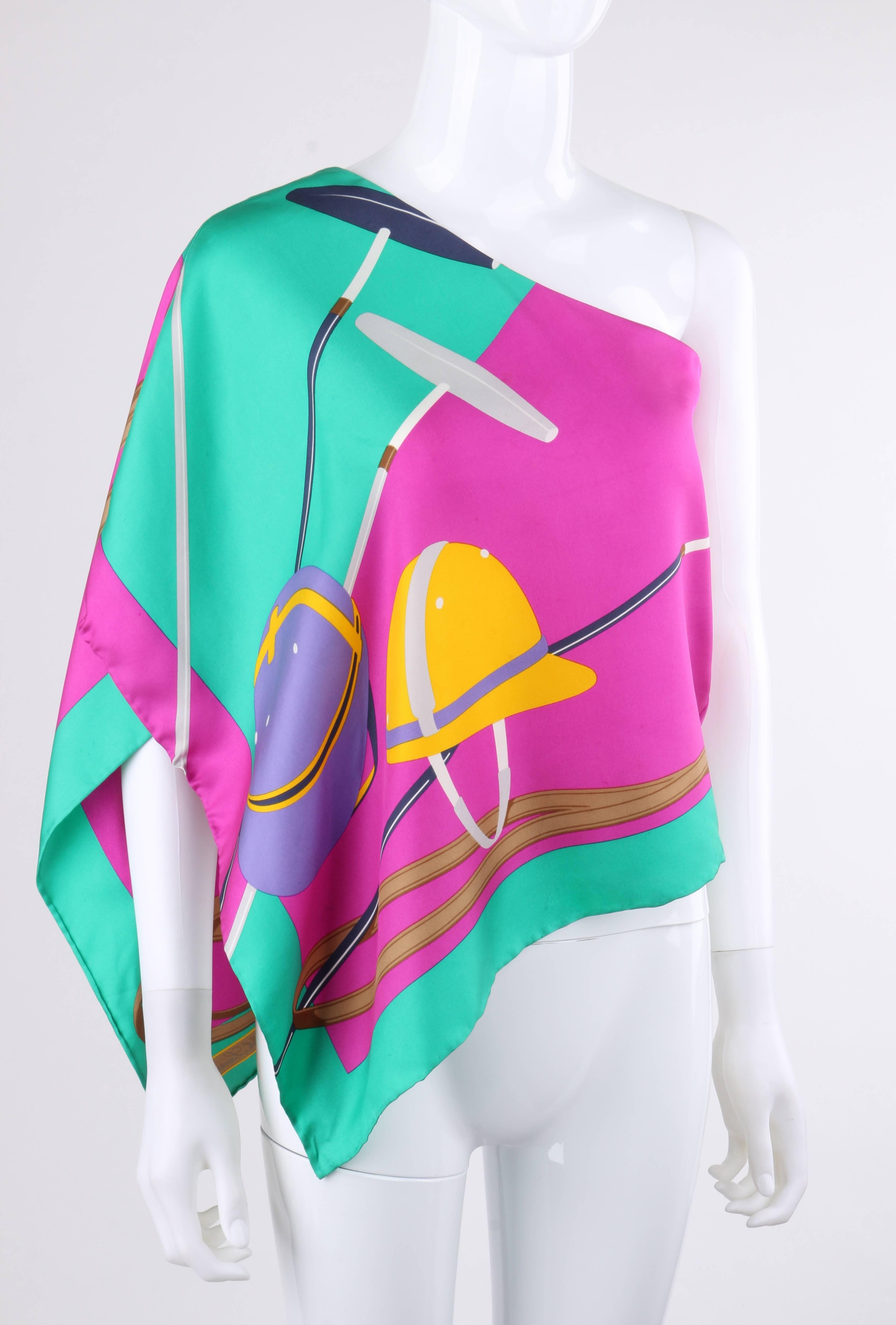 Ralph Lauren Collection (Purple Label) 100% silk one shoulder scatf blouse. Bias draped silk scarf with a central polo helmet, mallet, and horse bridle motif on kelly green and fuchsia background. Invisible zipper with hook and eye closure at left