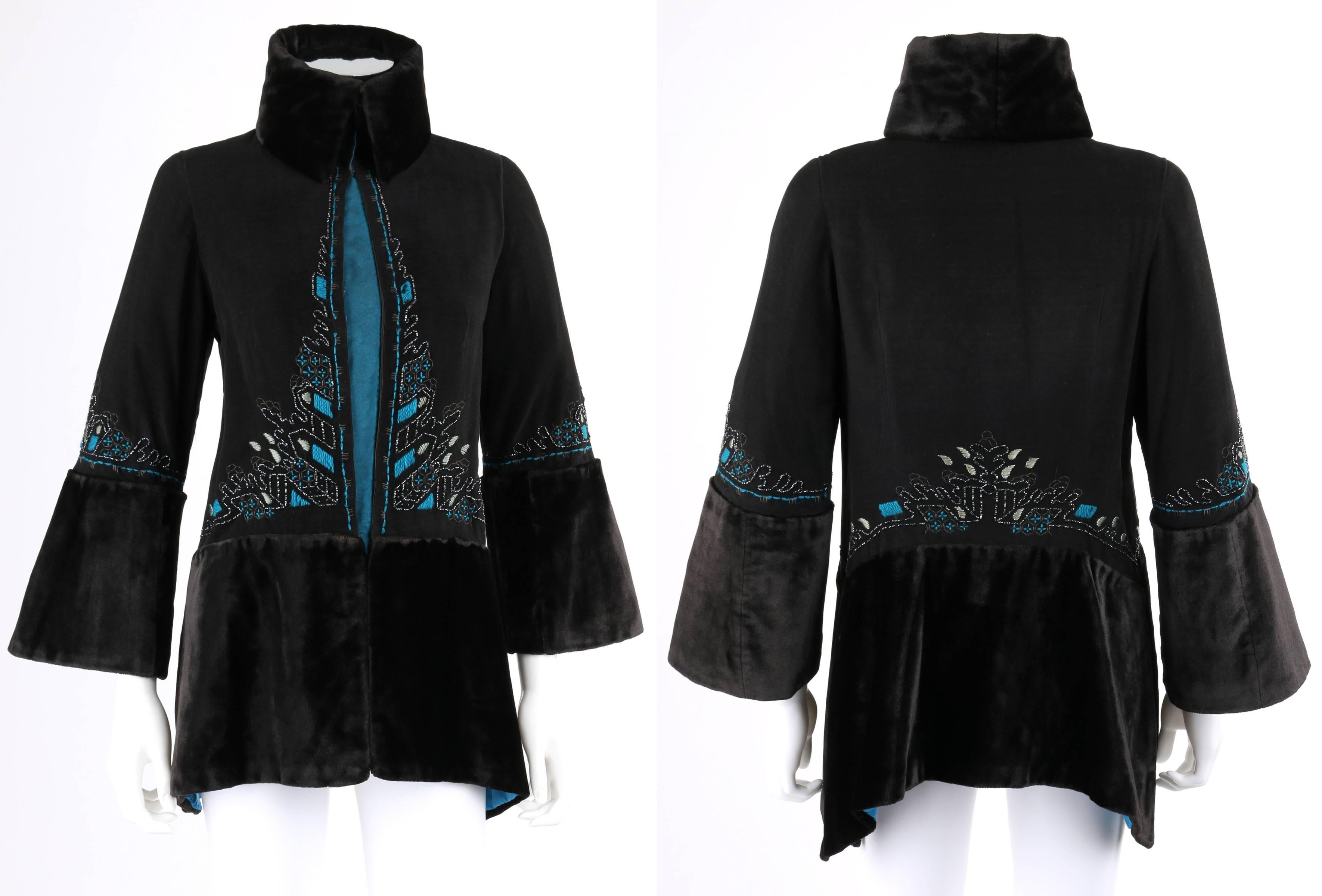 Vintage c.1910's Edwardian Couture one of a kind black & peacock blue / teal wool embroidered jacket. Embroidered detail along center front, waistline, and sleeves in shades of teal, etc., with black beaded embellishment. 3/4 length bell sleeves