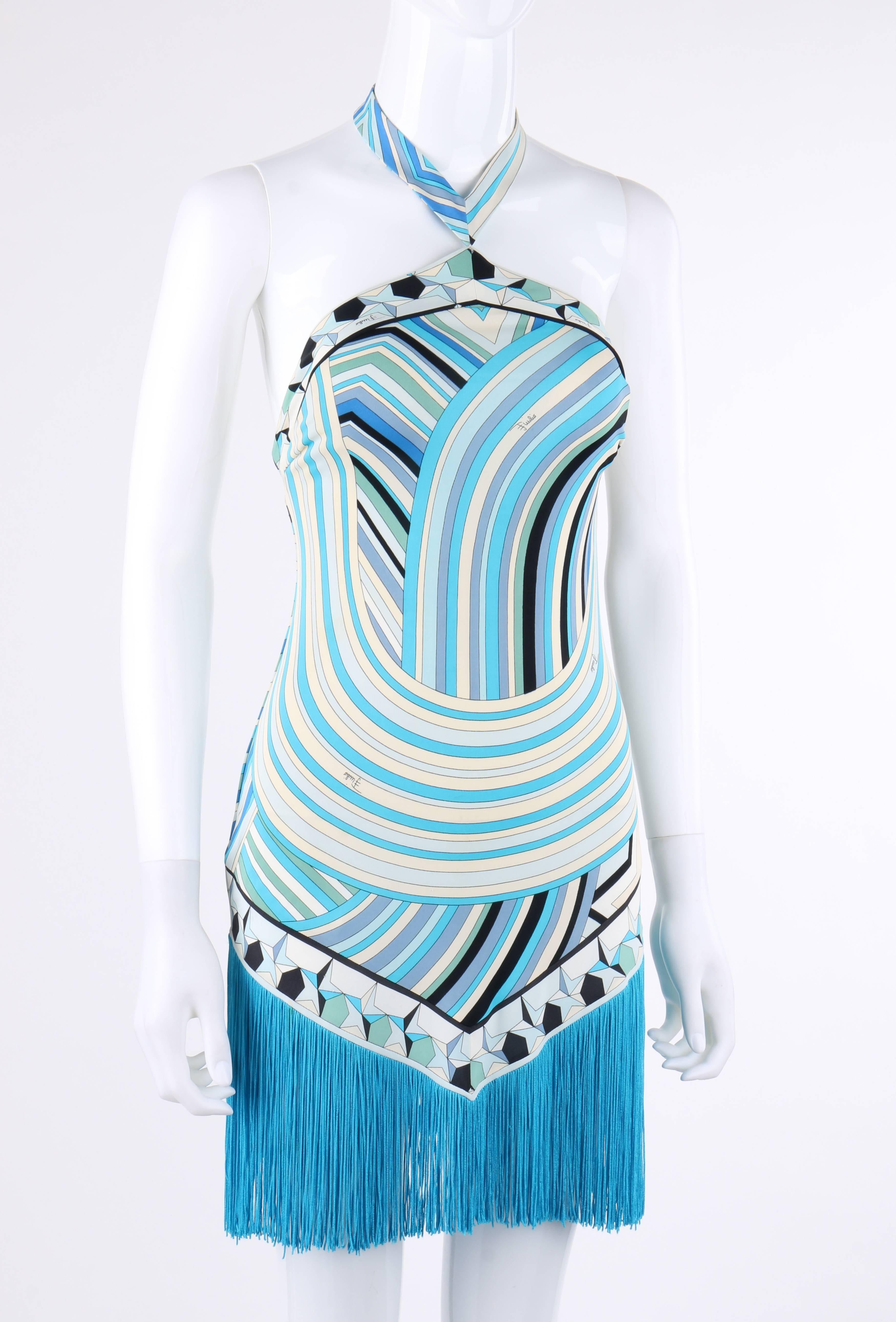Emilio Pucci Spring/Summer 2008 halter top mini dress (which could double as a stunning beach cover). Multicolor signature star print in shades of blue, ivory, green, black, and white. Halter top with two button and loop closure at center back. Low