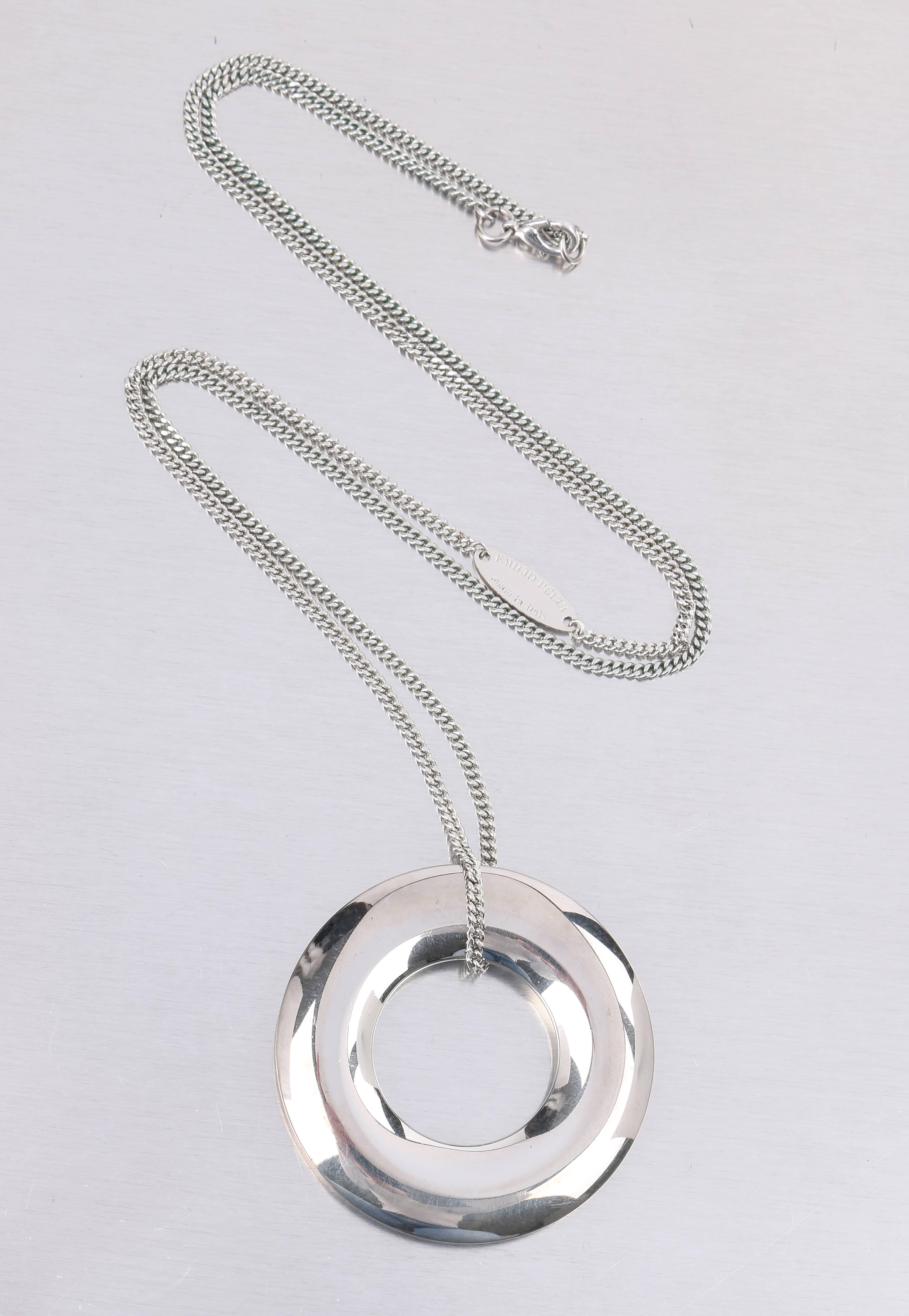 Rare Emilio Pucci long silver-toned O-ring pendant statement necklace. Large silver-toned polished metal O-ring pendant. Pendant is suspended from a long thin curb chain with an oval tag stamped 
