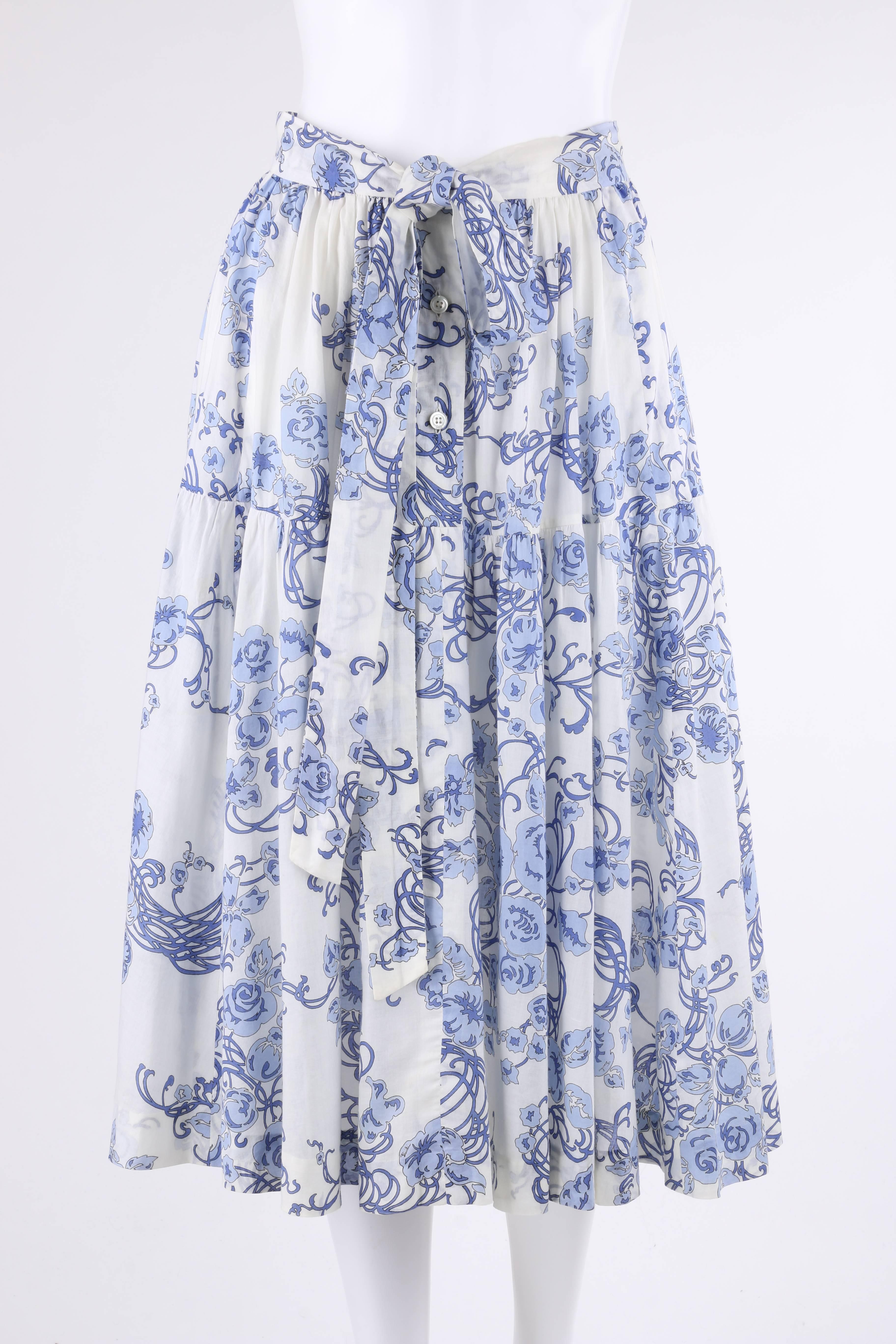 white and blue floral blouse