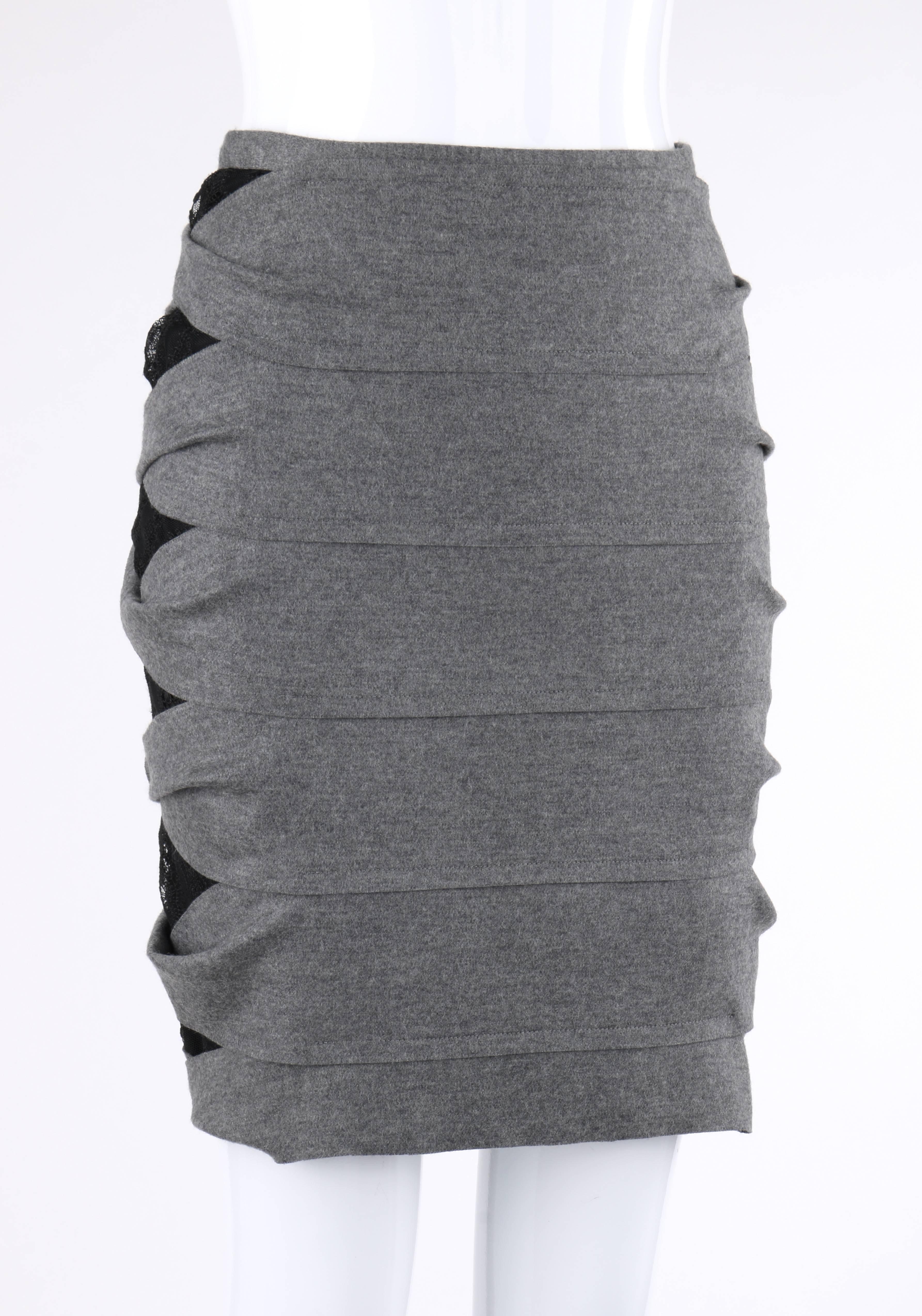 Fendi Pre-Fall 2012 gray wool banded pencil skirt; new without tags. Runway look #6. Six tiered bands with twist detail at side seams. Black floral lace underlaid side seam panels. Raw edge detail. Center back invisible zipper with hook and bar