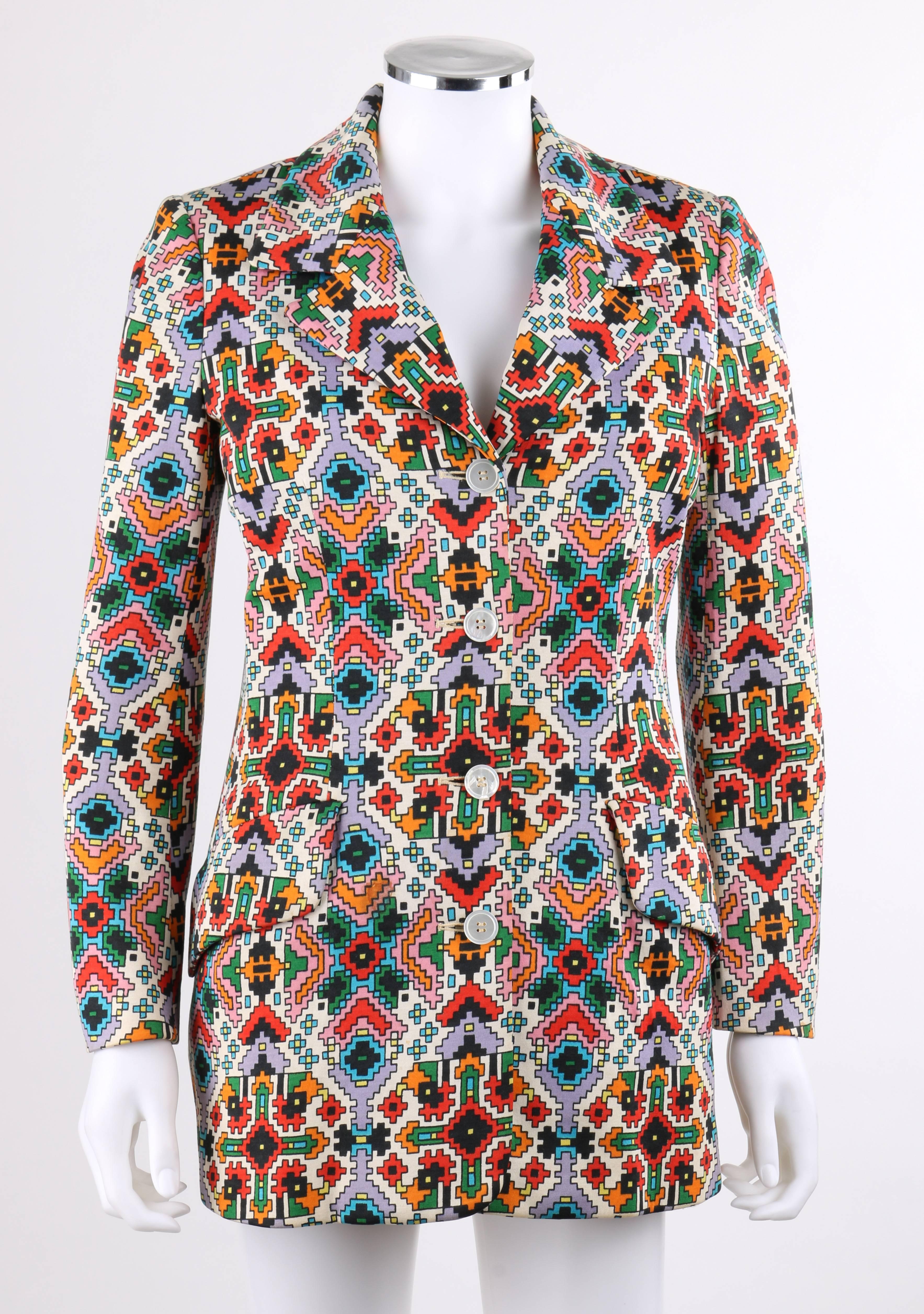 Beene Bazaar c.1970's notched lapel collar knit blazer with an all over geometric pixel kaleidoscope print on off white in shades of red, orange, green, yellow, black, blue, and purple. Designed by Geoffrey Beene. Long sleeves with three buttons at