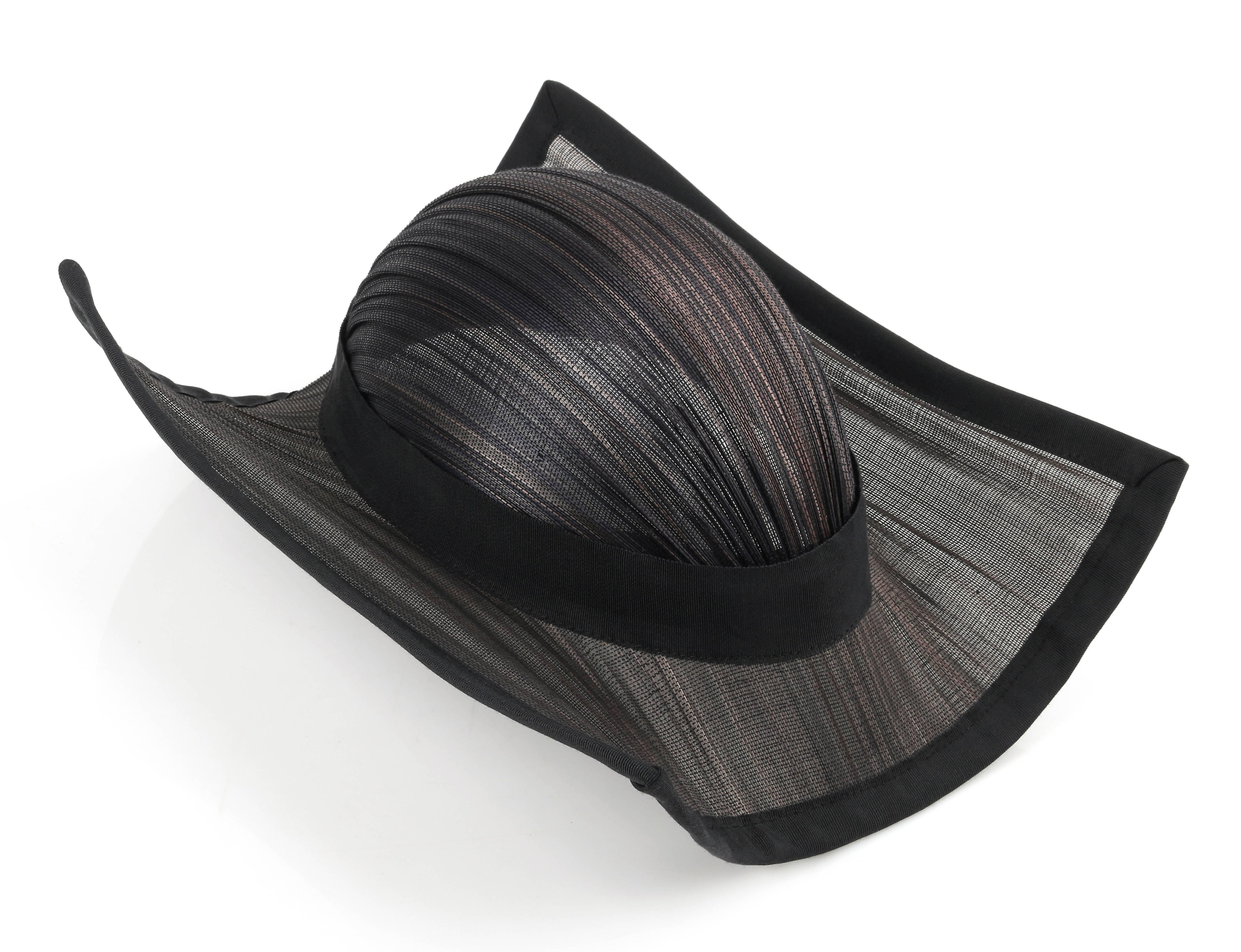 Couture Kate Bishop black grasscloth wire framed sculptural hat. Designed by Kate Bishop; one of the milliners for the movie 'Titanic'. Semi-sheer grasscloth body striped with shades of black, brown, and gray. Narrow rounded crown with knife pleat