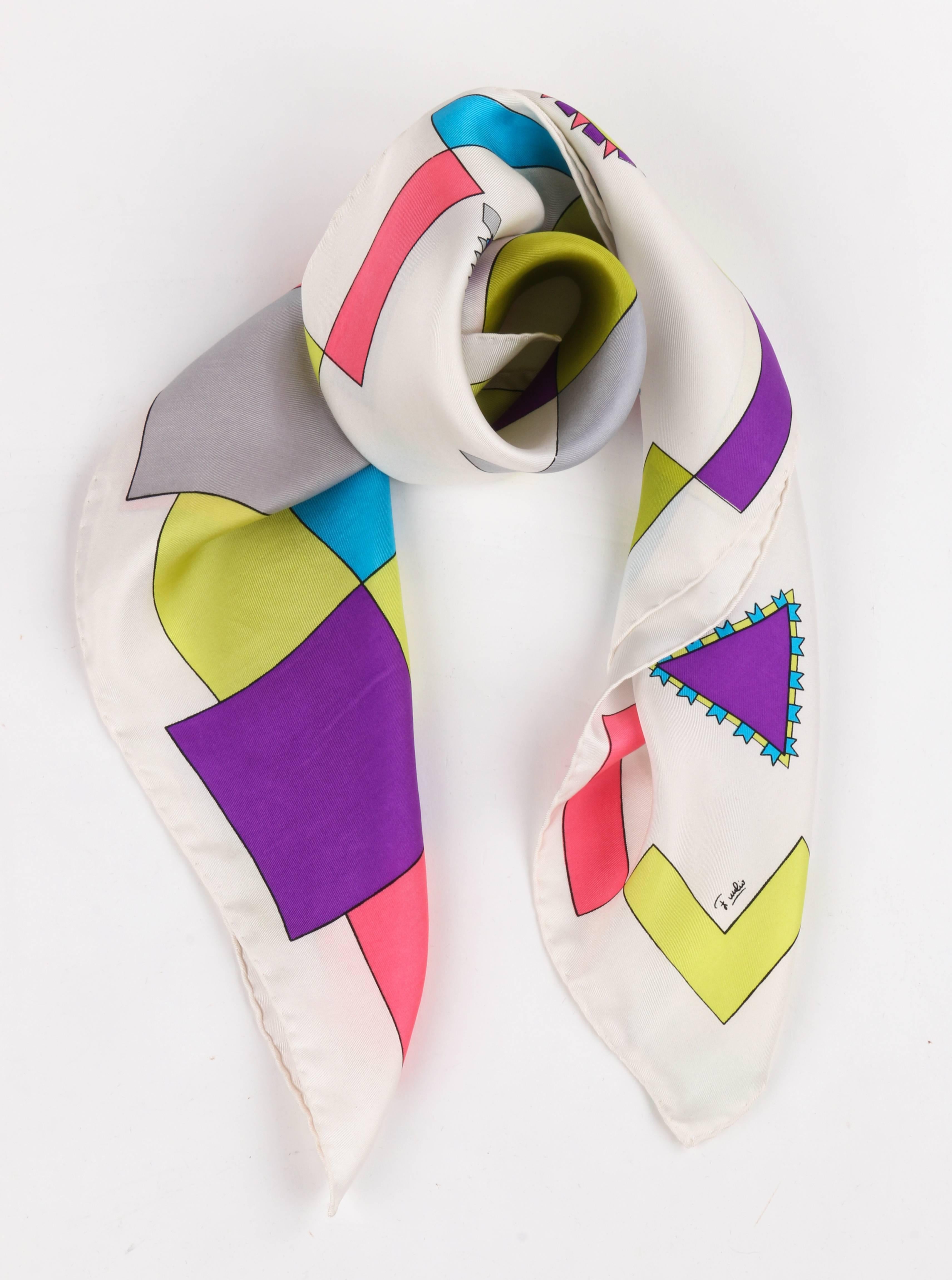 Vintage Emilio Pucci c.1970's multicolor geometric signature print silk scarf in shades of gray, pink, chartreuse, teal, and purple. White background. Colored block motif in top right corner diagonally split with scattered geometric shapes in bottom