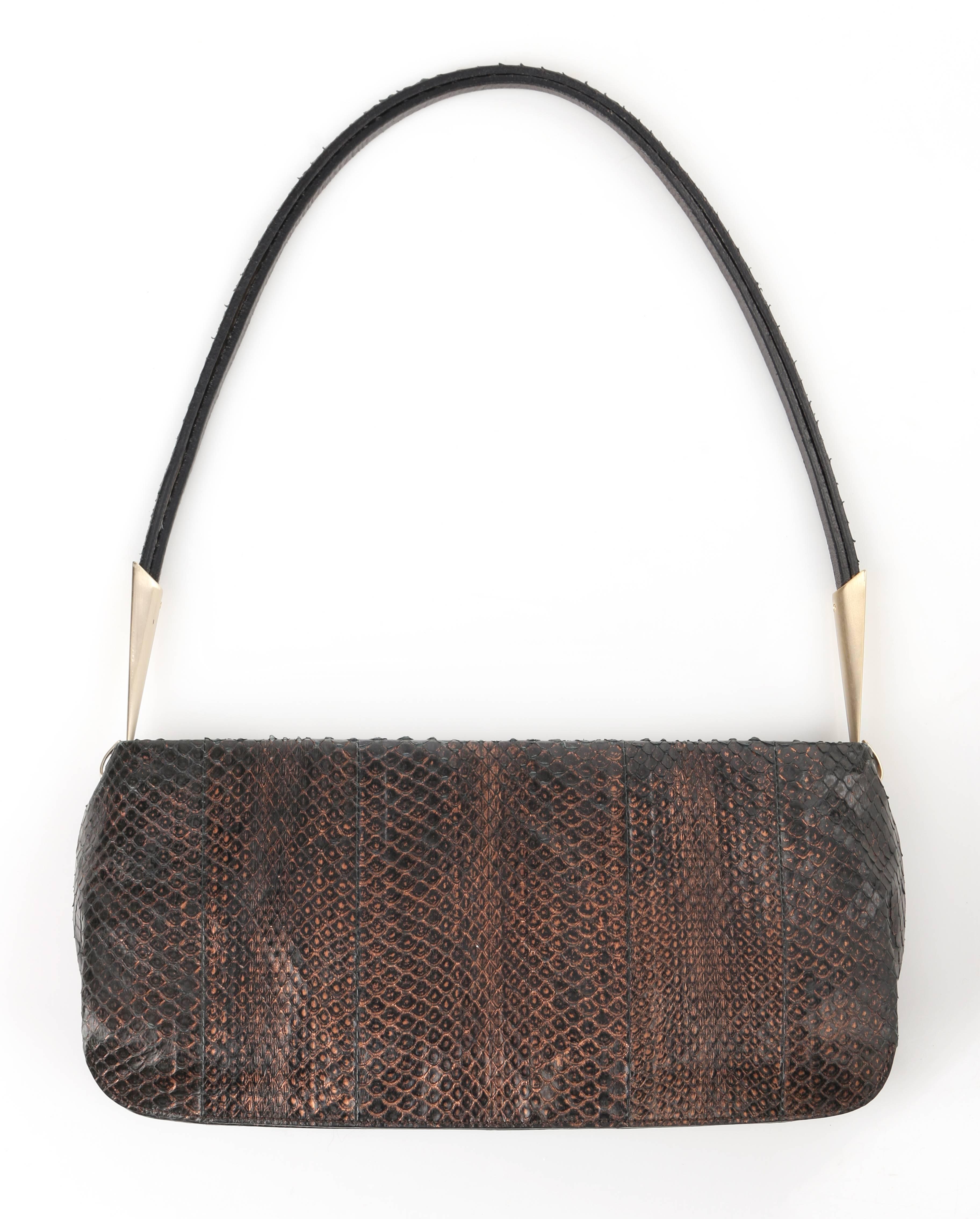 Bottega Veneta bronze metallic snakeskin leather baguette; New without tags. Single thin double layered snakeskin leather strap with brushed gold-toned metal hardware. Zip top closure with brown leather zipper pull. Black suede lined interior.