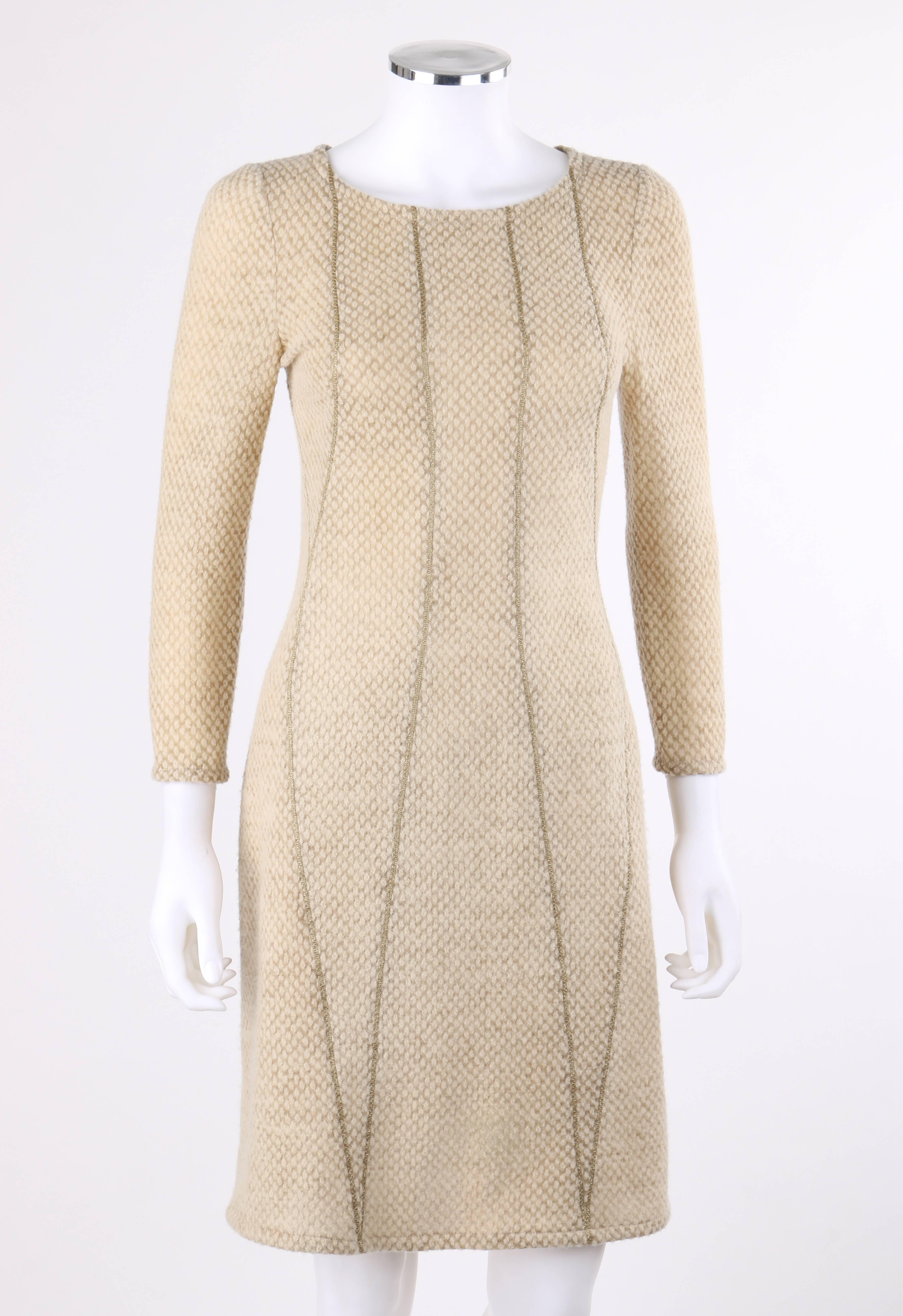 Bottega Veneta Autumn/Winter 2011 beige textured wool blend panel cocktail dress. Wide scoop neckline. 3/4 length sleeves. Multiple panels with metallic gold flat piped seam detail. Shift style. Center back invisible zipper. Unlined. Unmarked Fabric