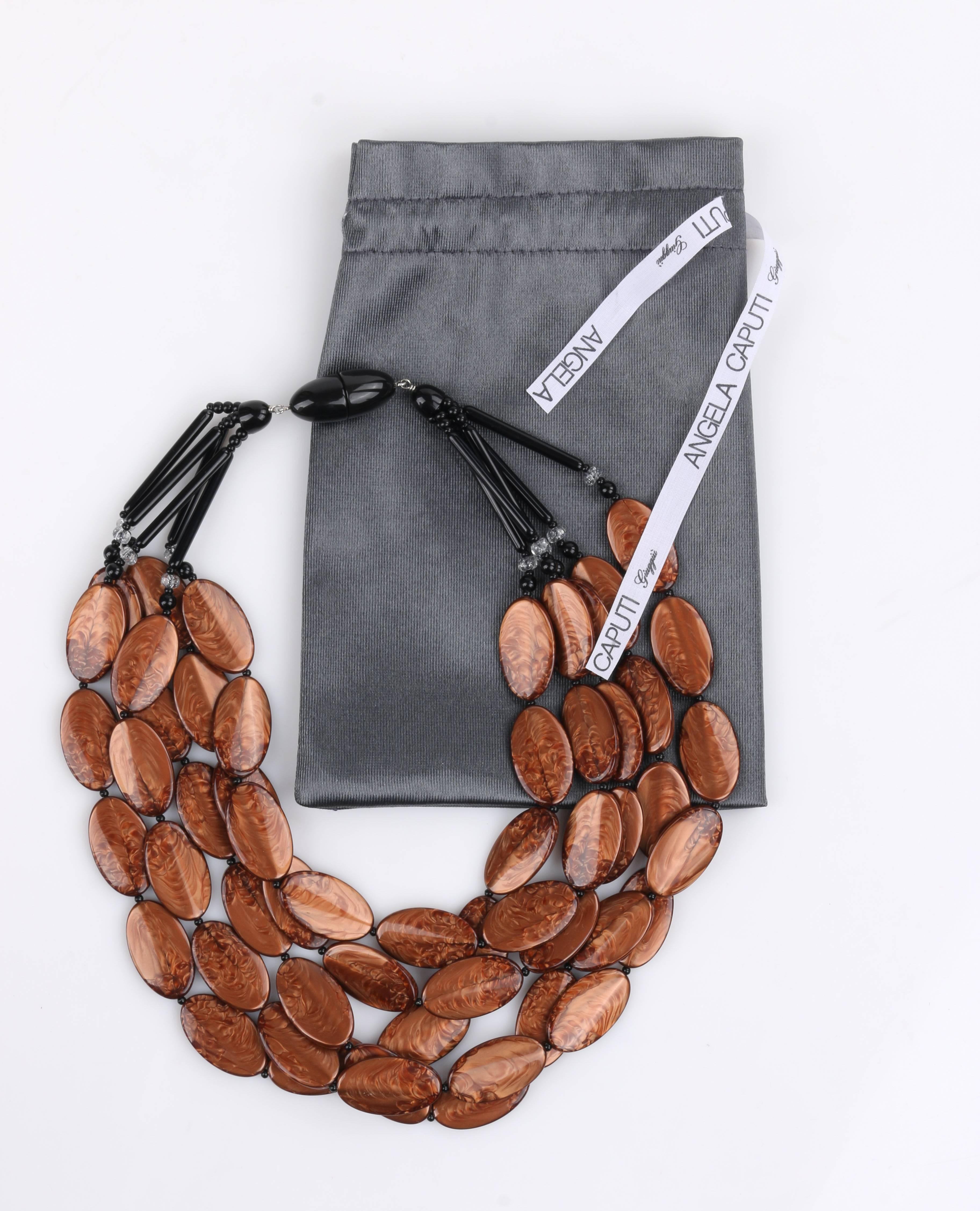 Angela Caputi Giuggui copper lucite like resin oval beaded multi-strand statement bib necklace. Five beaded strands made up of marbleized oval resin beads with black seed bead spacers at front of necklace. Each strand has black polished spherical