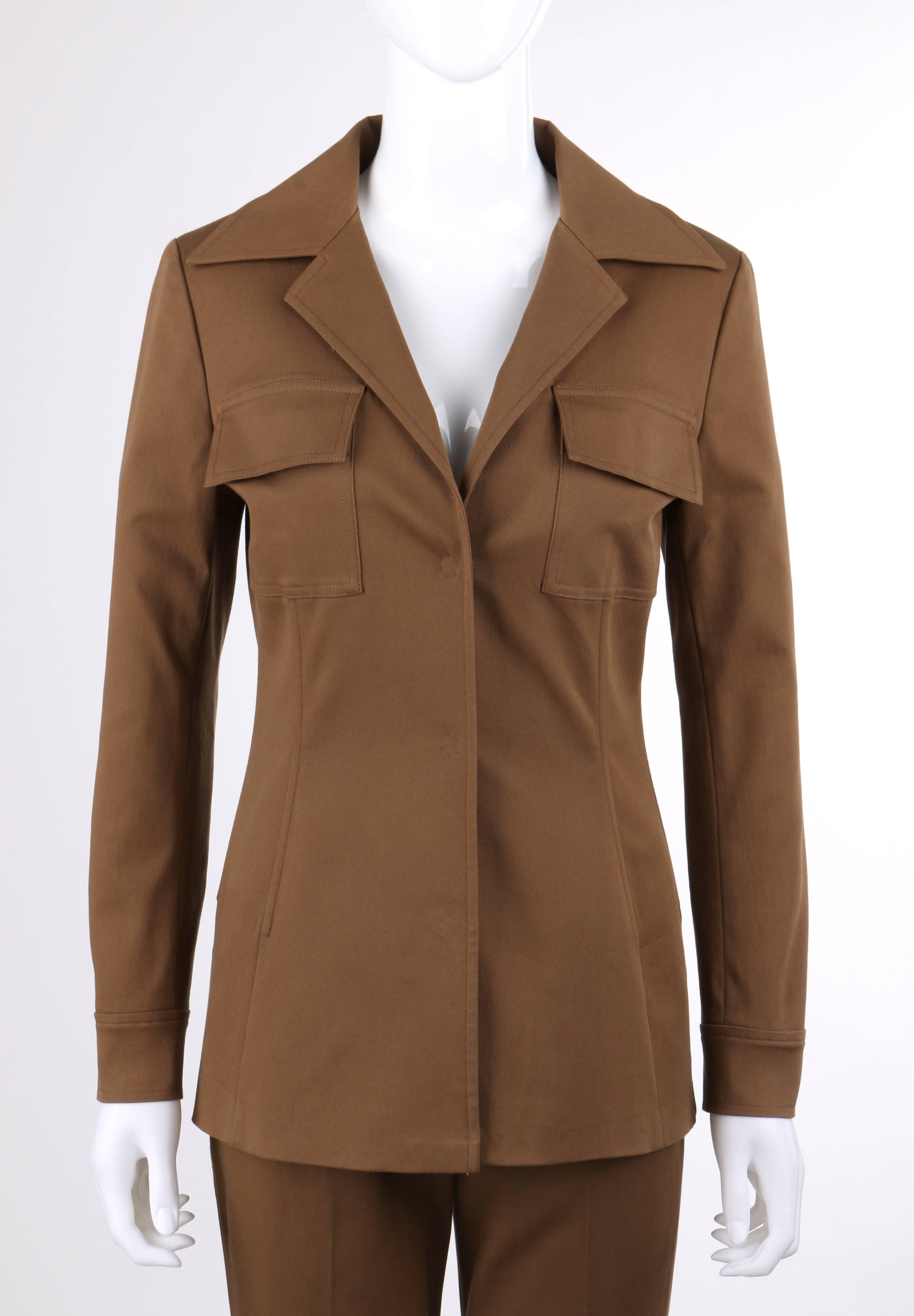 Dolce & Gabbana Resort 2008 two piece brown stretch cotton pant suit. Long sleeve blazer with single snap closure at cuff. Notched lapel collar. Two front patch pockets with flap. Three center front hidden snap closures. Built in boning for