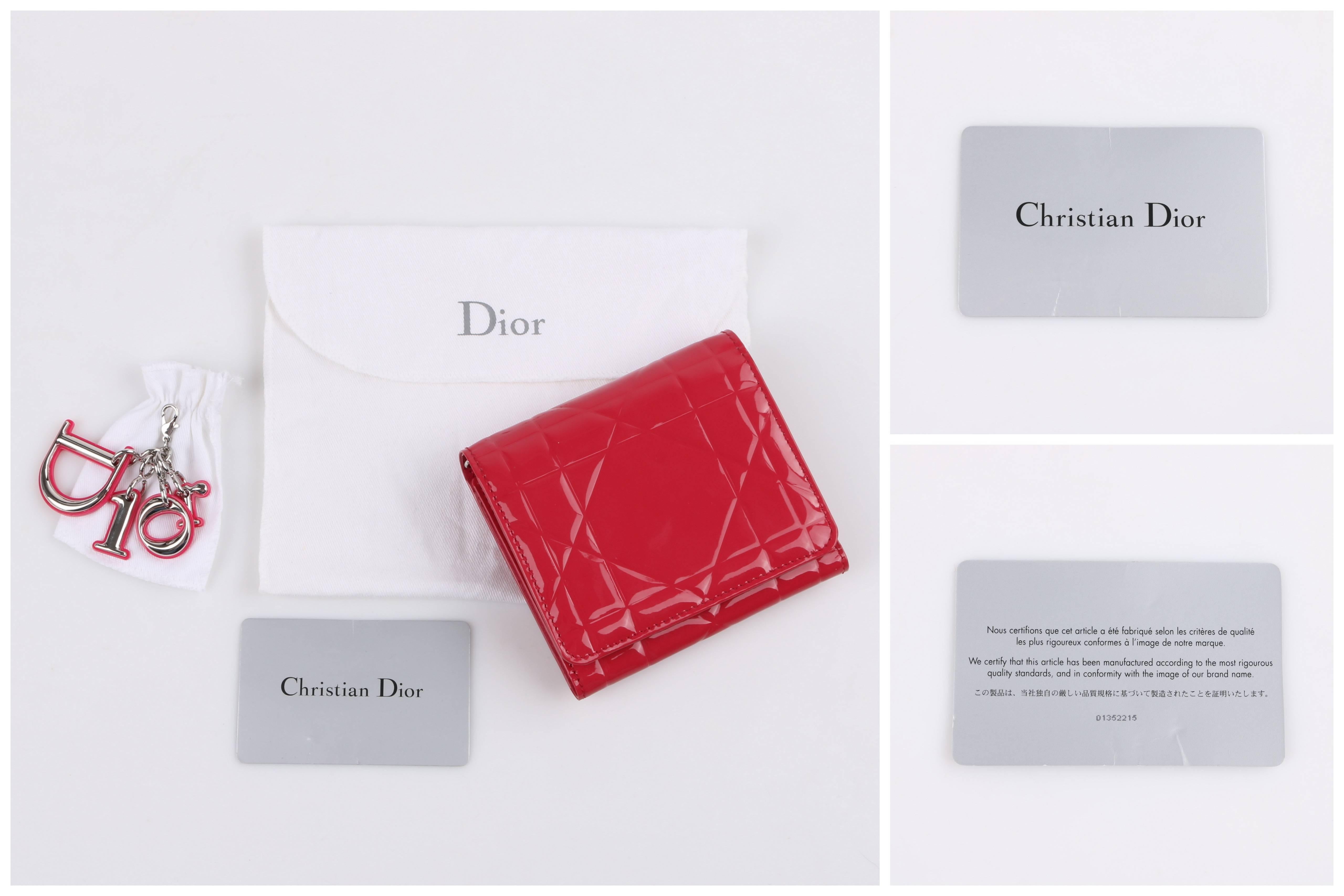 Dior Spring/Summer 2012 "Tutti Dior" fuchsia pink cannage patent leather tri-fold wallet. Cannage embossed glossy patent leather body. Tri-fold design with single snap closure. Lined in matte fuchsia leather. Seven interior card slots,