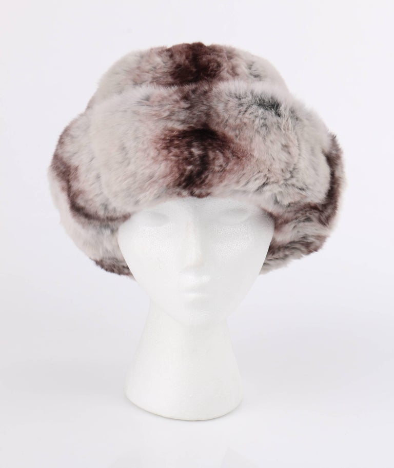 Vintage c.1960's Christian Dior Chapeaux chinchilla fur hat designed by Marc Bohan. Bell shaped body with wide turned up brim. Heathered gray wool hat band with bow at center back. Gray silk faille lining. Gray grosgrain ribbon along interior brim.