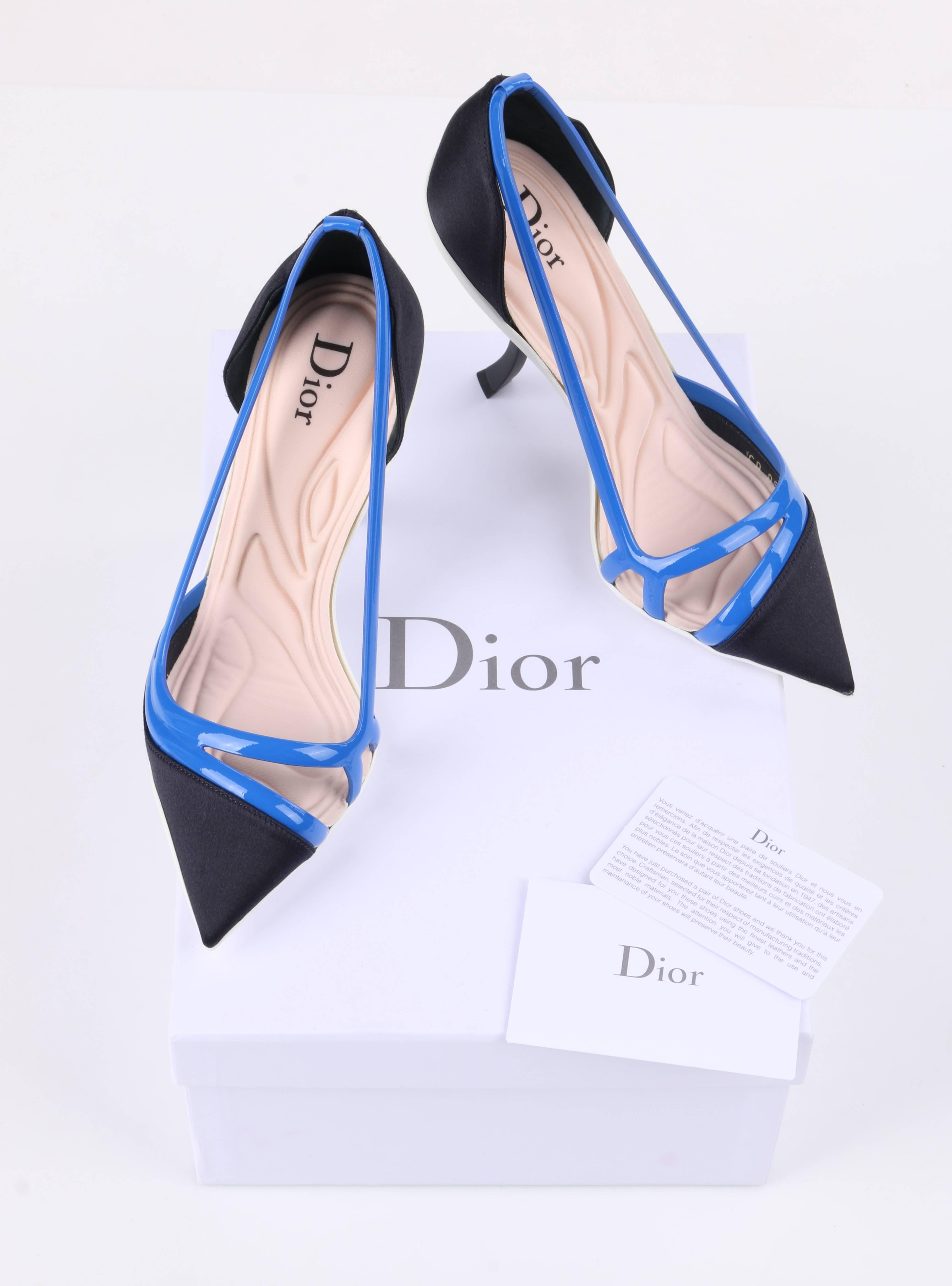 Christian Dior Resort 2014 "Def Cruise 2014 Pump". Runway look #23. True blue patent leather cut work straps. Midnight blue satin covered pointed toe and heel. White sole. Curved stiletto heel. D'Orsay style. Nude sculpted neoprene padded