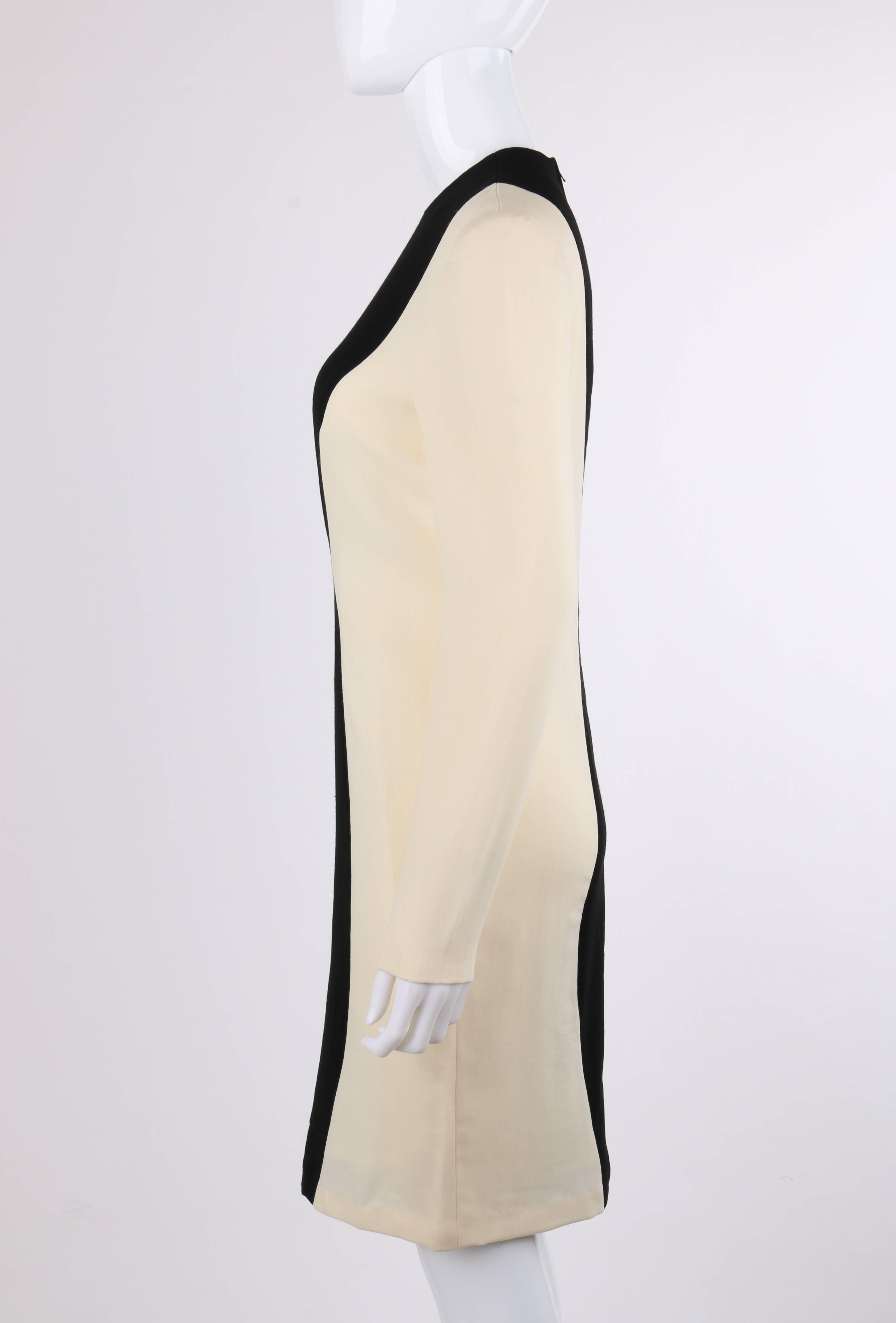 PIERRE CARDIN Robe droite à manches longues en laine noire et ivoire à empiècements de couleurs, années 1980 Pour femmes en vente