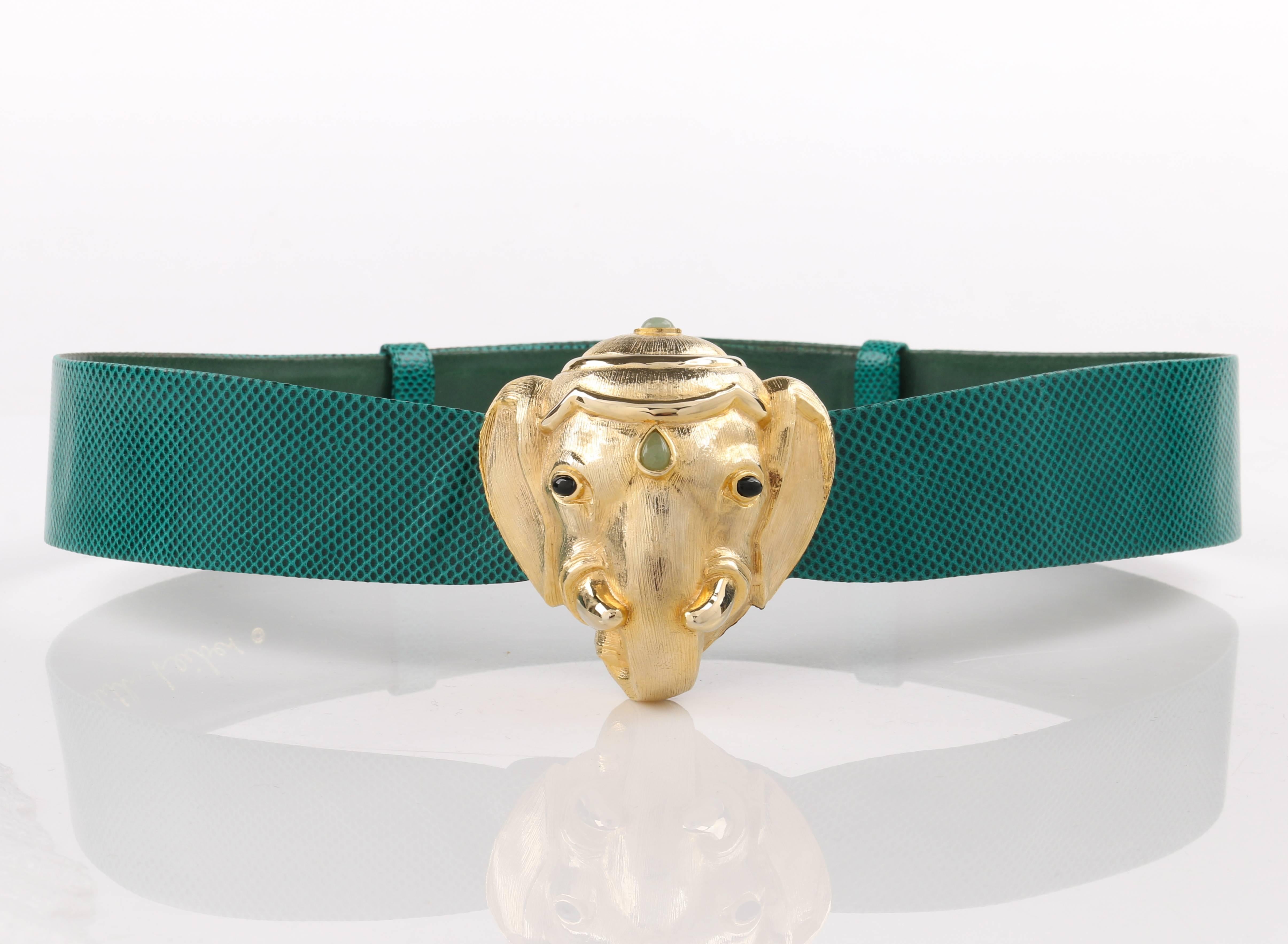 Vintage Judith Leiber c.1980's emerald green lizard skin leather gold Ganesh elephant head buckle belt. Emerald green lizard skin adjustable sliding leather body. Gold-toned metal Ganesh elephant head buckle with cabochon stones in onyx and light
