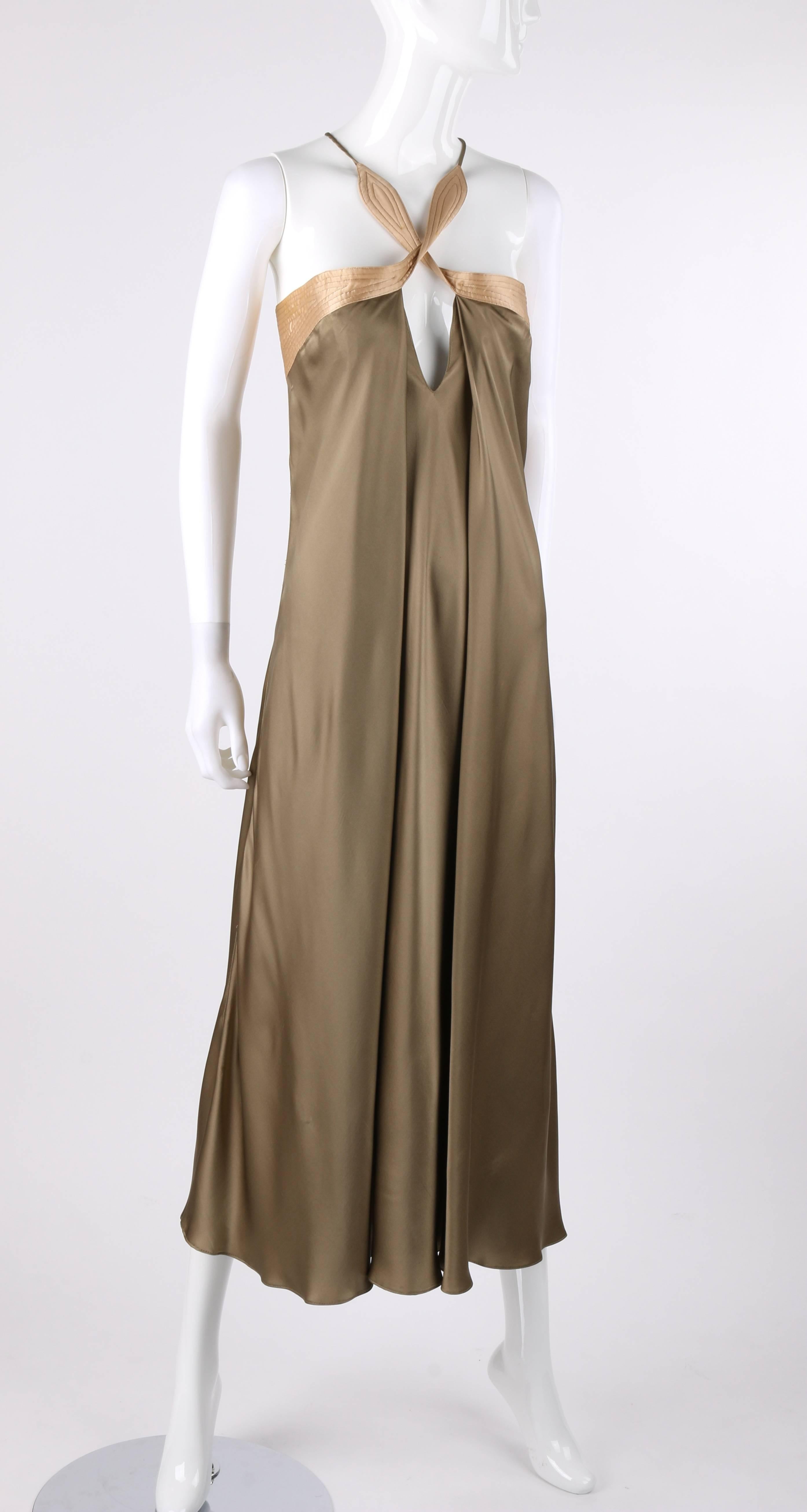 Geoffrey Beene c.1990's taupe and blush gold silk satin twist halter slip dress. Light gold quilted and thin taupe strap criss cross / twisted front and back halter straps. Light gold banded bodice with thin band at front ascending to waistline at