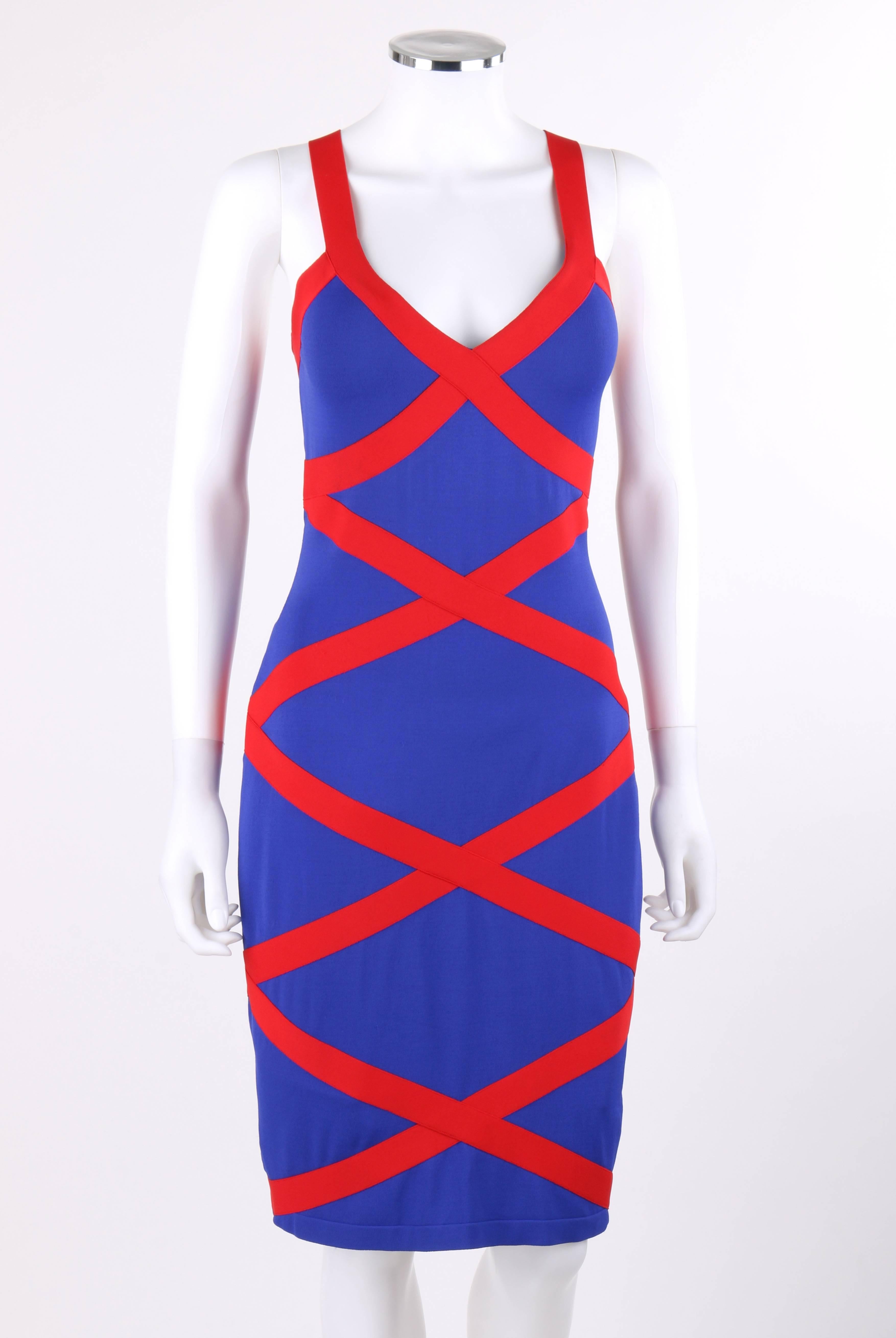 Alexander McQueen Resort 2010 royal blue and red criss-cross bandage bodycon dress. V-neckline. Thick straps which cross from front to back to form a v-shape. Royal blue base with red bandage over top forming a criss-cross pattern throughout.