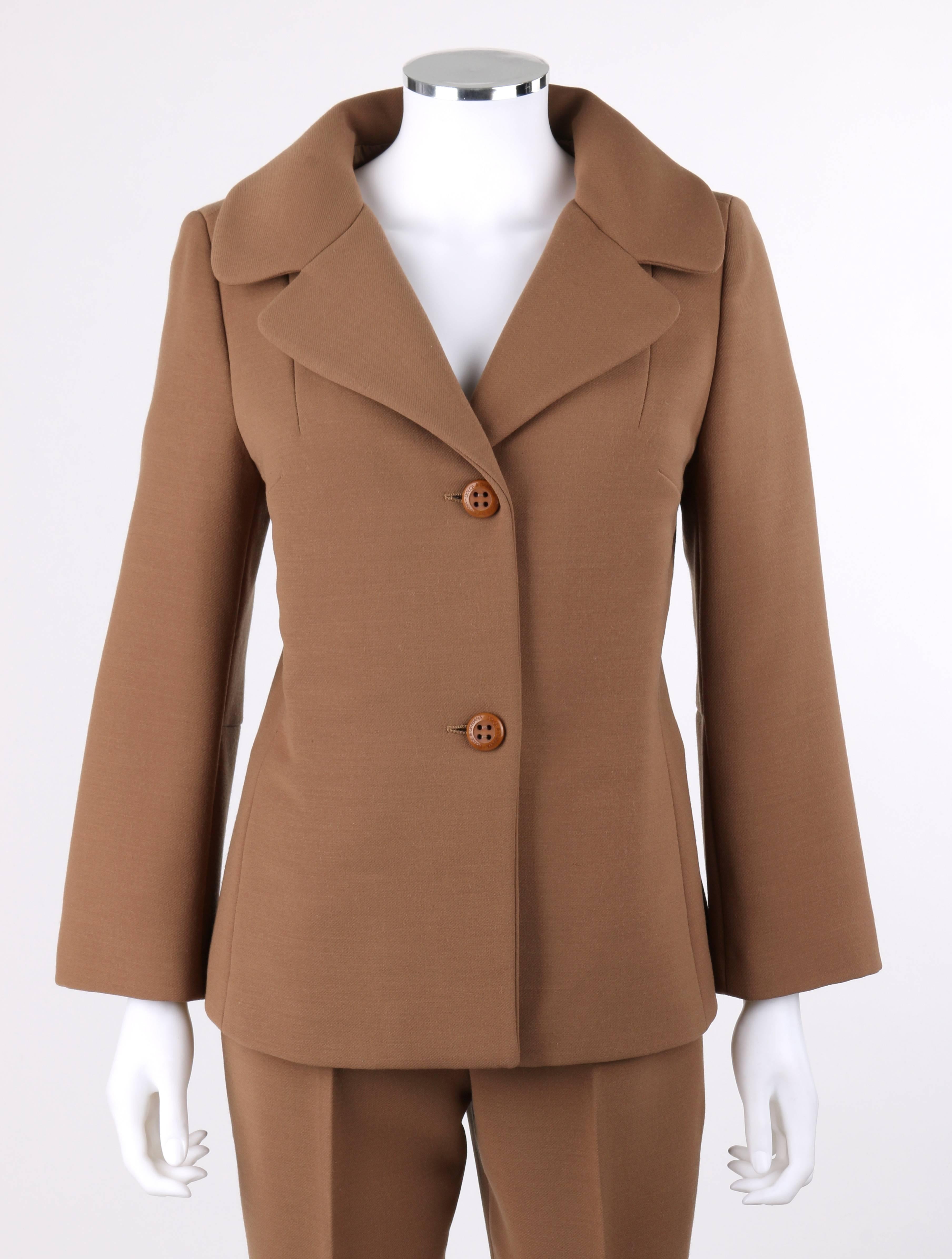 Dolce & Gabbana late 1990's two piece tan wool two button jacket cropped pant suit set. Rounded notched lapel collar blazer. Long wide sleeves. Two center front button closures. Princess seams. Fully lined in signature 