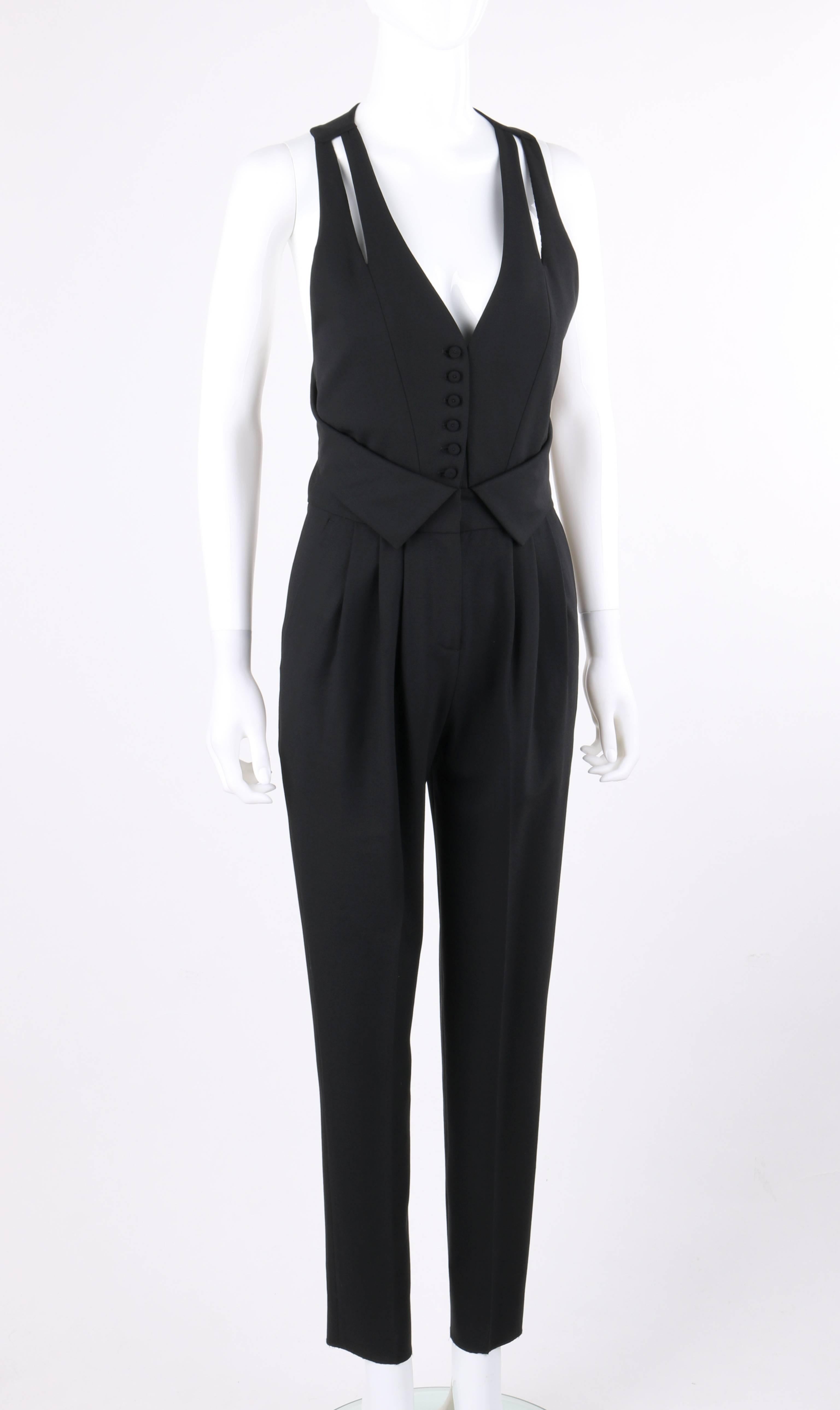 Fendi Resort 2009 black wool sleeveless tapered pant tuxedo jumpsuit. Same jumpsuit worn by Diane Kruger for the 2009 Hamilton Behind the Camera Awards. Sleeveless with cut-work detail at either side of front. Deep v-neckline. Five center front