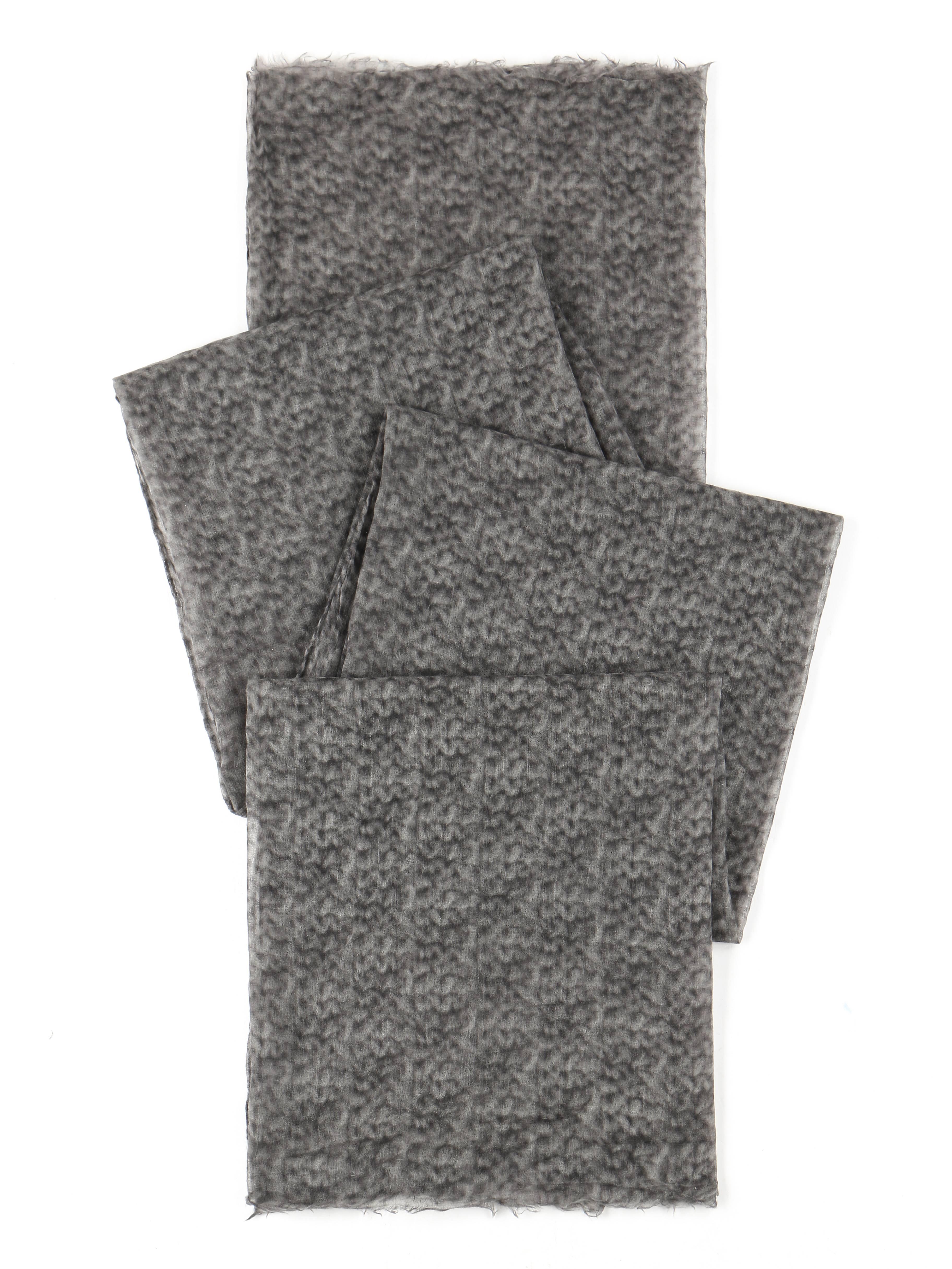 Brunello Cucinelli 100% Cashmere Gray Raw Rolled Edge Large Oblong Wrap Scarf

Brand / Manufacturer: Brunello Cucinelli 
Designer: Brunello Cucinelli
Style: Scarf
Color(s): Shades of grey
Marked Fabric Content: 100% cashmere 
Made In:
