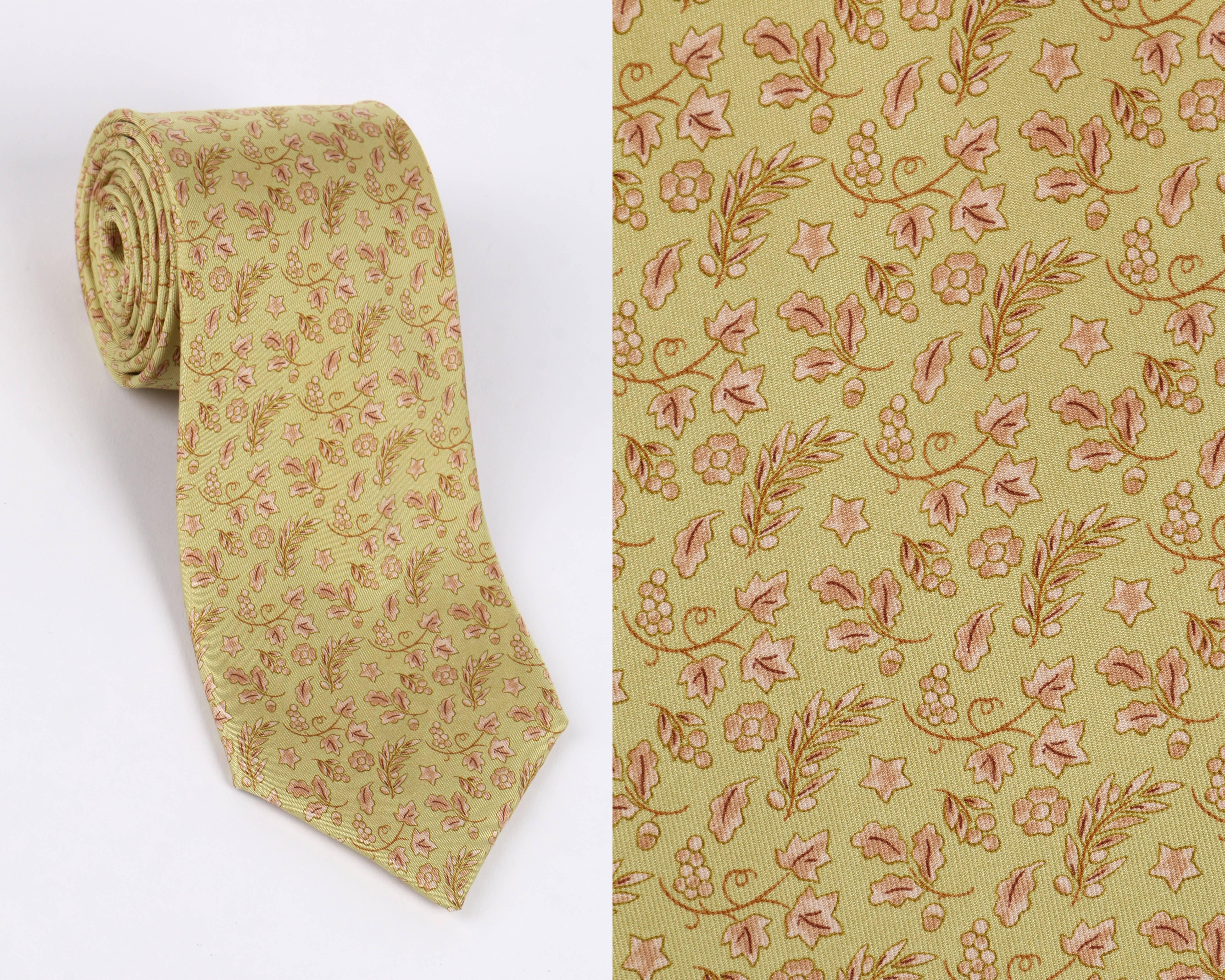 Hermes light chartreuse grape vine & foliage print silk necktie. Print in shades of tan and beige on light chartreuse light green silk. 