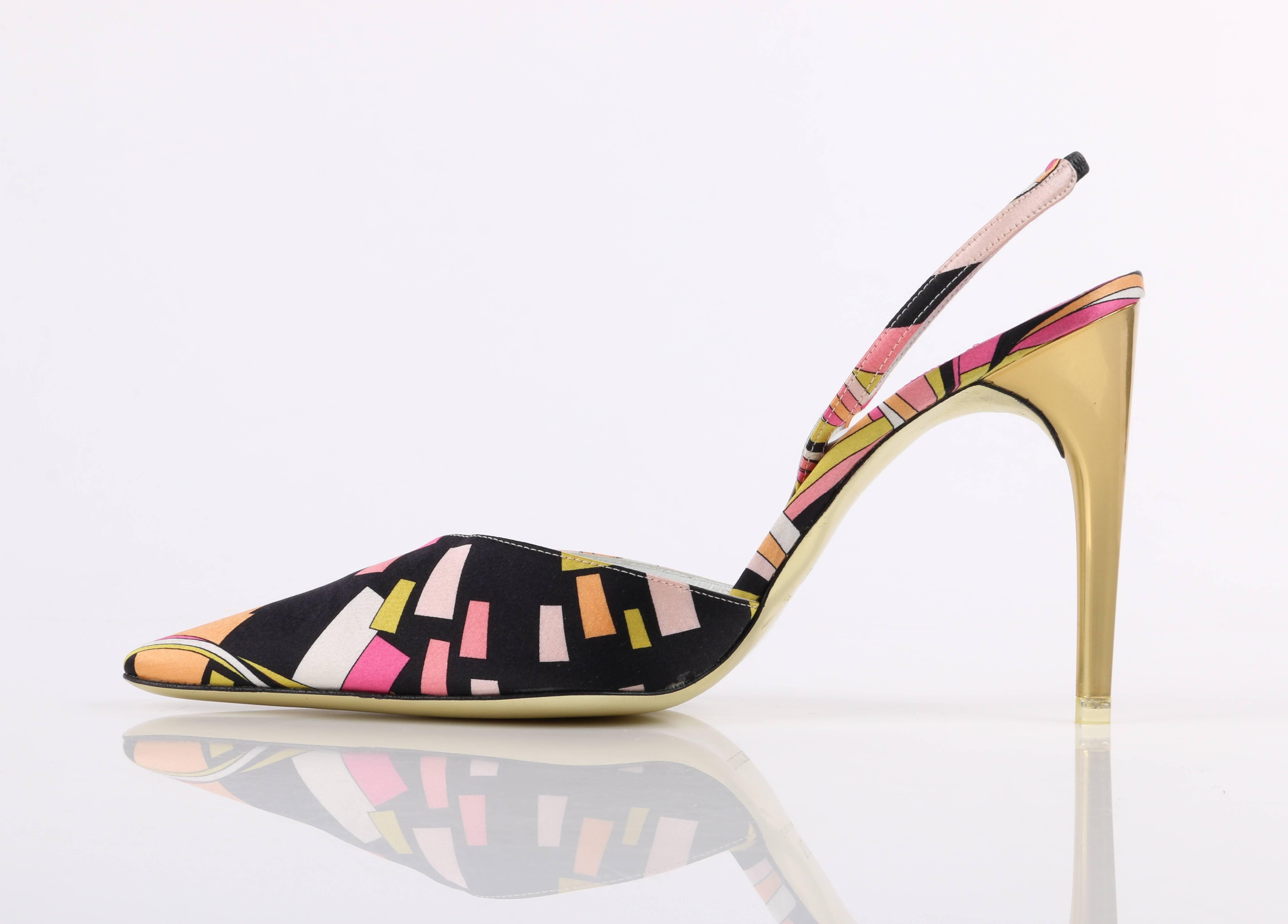 Emilio Pucci Spring/Summer 2005 multi-color geometric print satin pointed toe sling back gold pumps / high heels. Designed by Christian Lacroix. Multi-color geometric print silk satin upper in shades of black, pink, yellow, orange, and white. Thin