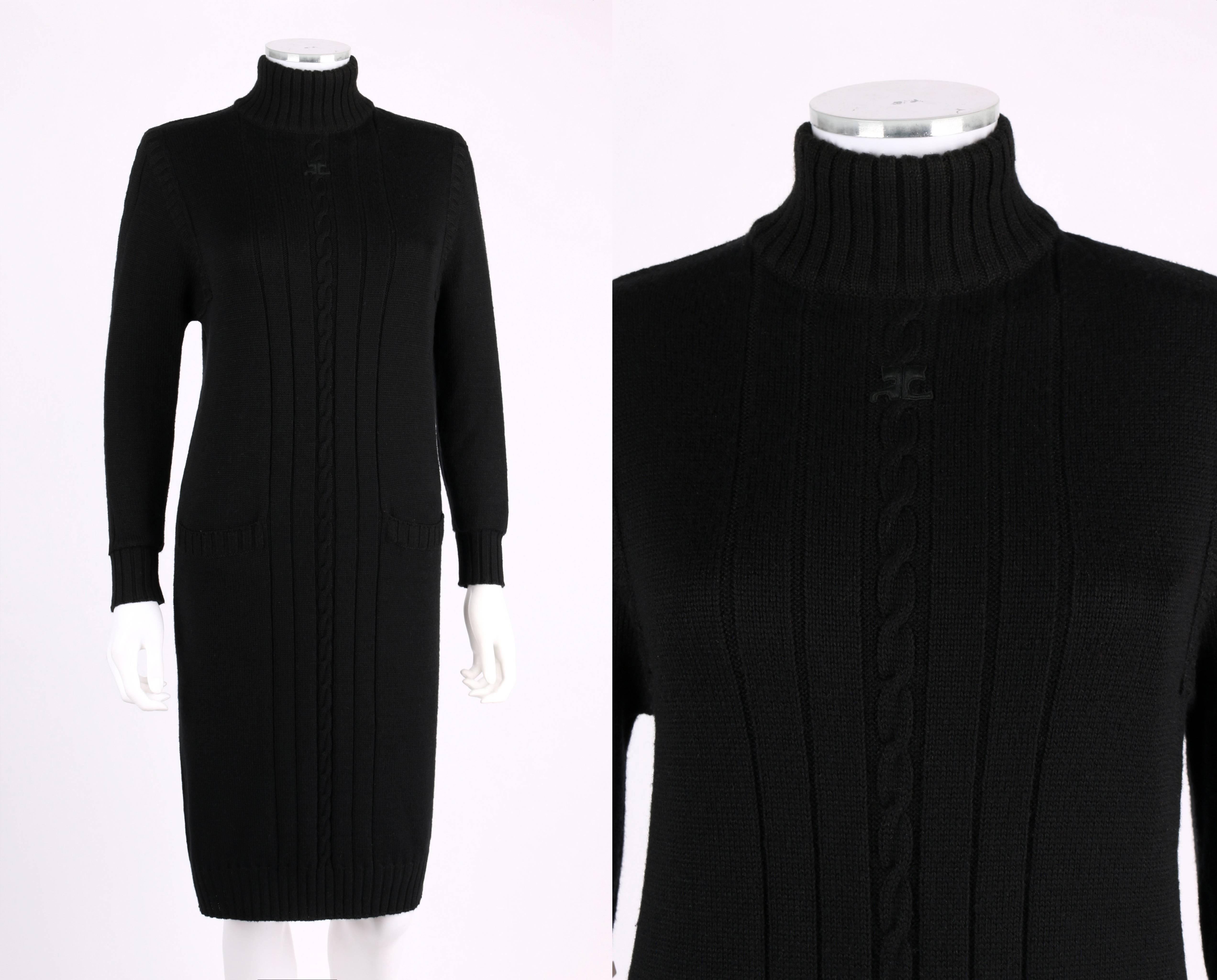 Vintage Courreges c.1980's black wool cable knit mock neck sweater dress. Designed by Andre Courreges. Mock neck rib knit collar. Long sleeves. Large cable and rib knit detail from collar to hem at center front, center back, and along top of