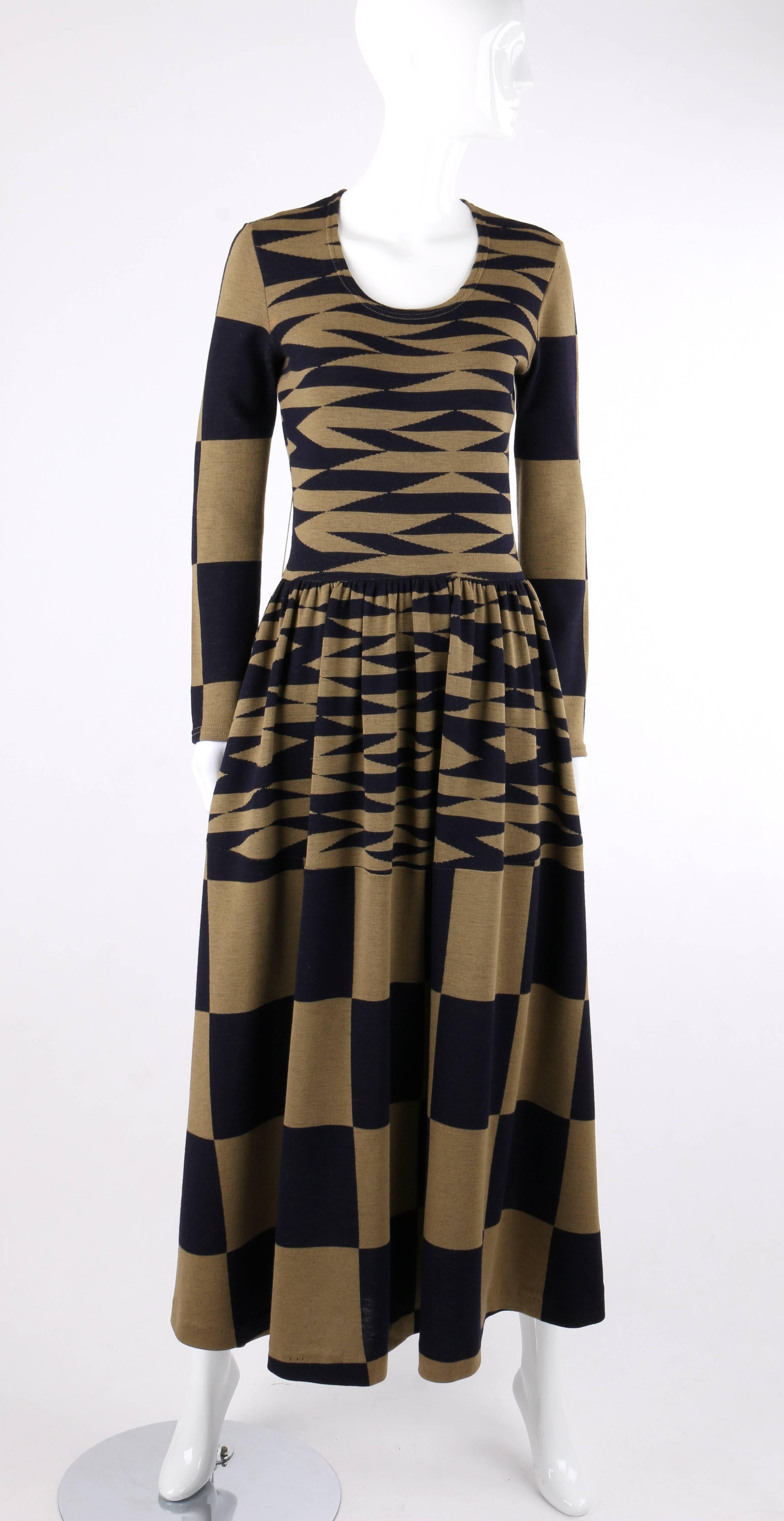 Vintage Rudi Gernreich Design for Harmon Knitwear c.1971 op art check pattern wool knit mod maxi dress. As seen modeled by Peggy Moffitt in 1971. Navy blue and olive brown op art and checkered pattern knit. Deep scoop neckline. Long sleeves. Two