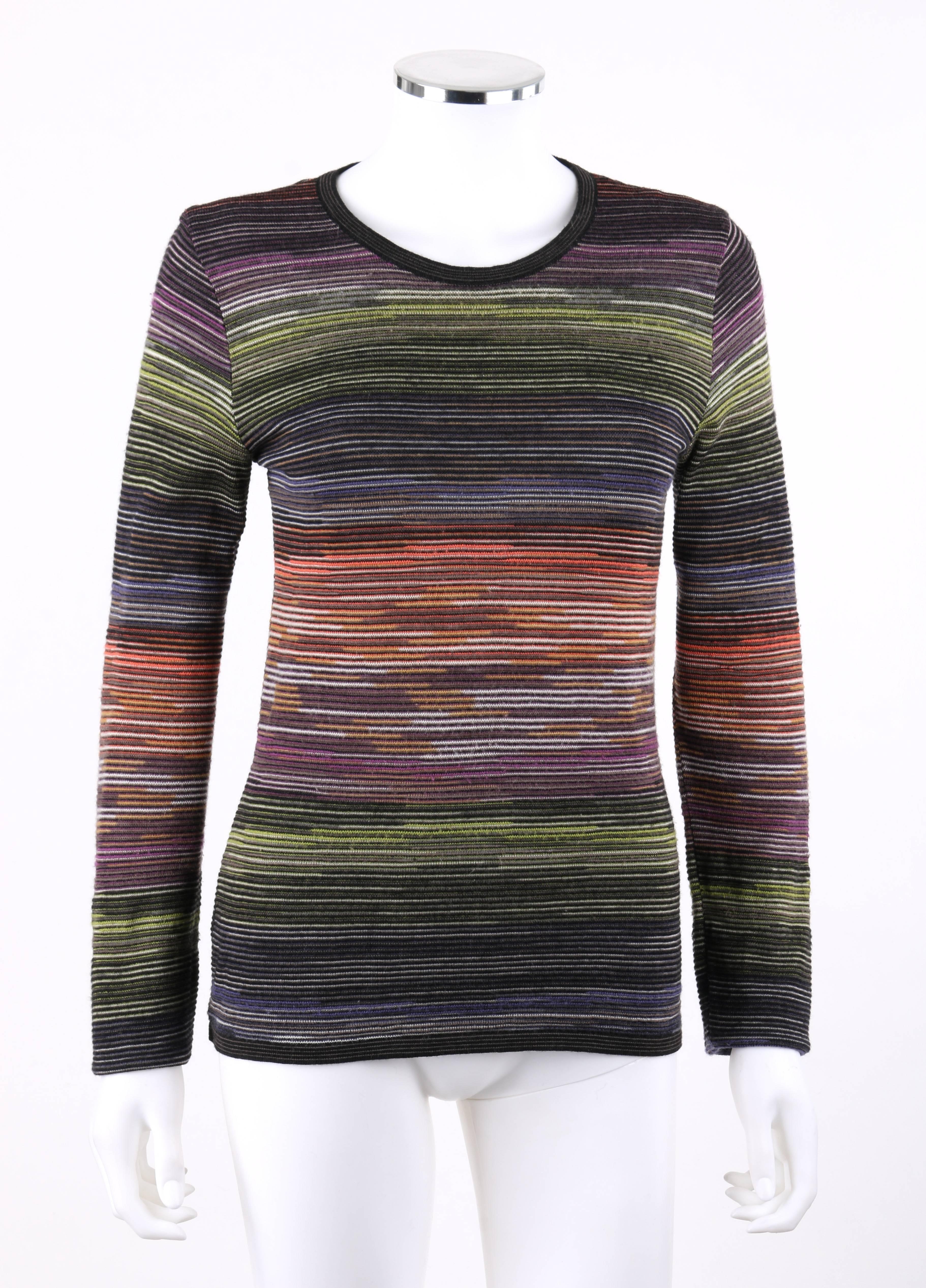 Missoni Sport rainbow striped wool knit long sleeve crew neck top. Crew neckline. Long sleeves. Black and gray striped rib knit detail at neckline, cuffs, and hem. Pullover style. Unlined. Marked Fabric Content: 