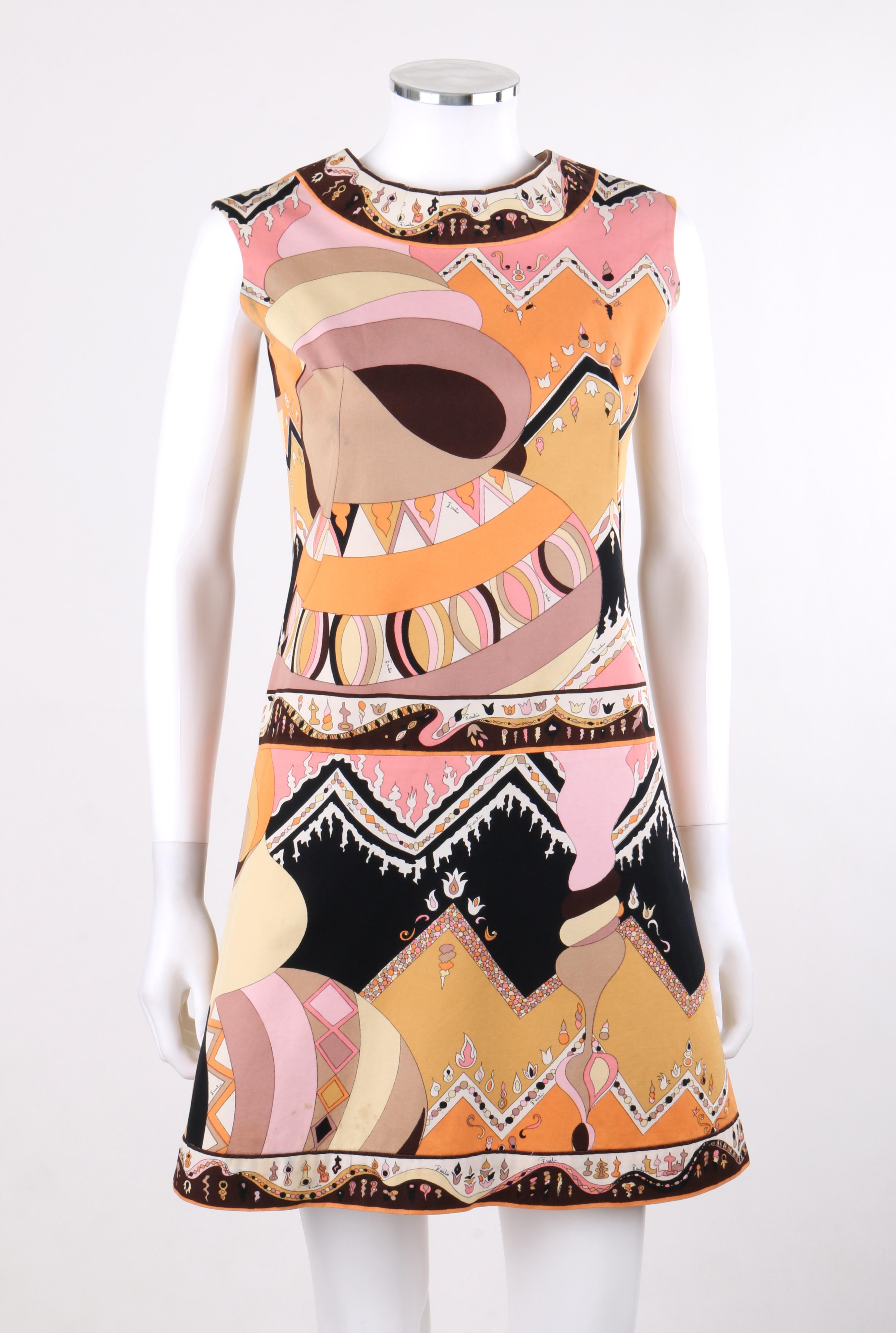 DESCRIPTION: EMILIO PUCCI c.1960's Mod Op Art Signature Print Sleeveless A-Line Dress
 
Circa: c.1960’s
Label(s): Emilio Pucci; Exclusively For Saks Fifth Avenue
Style: A-line dress
Color(s): Multi in shades of brown, beige, pink, orange, gold,