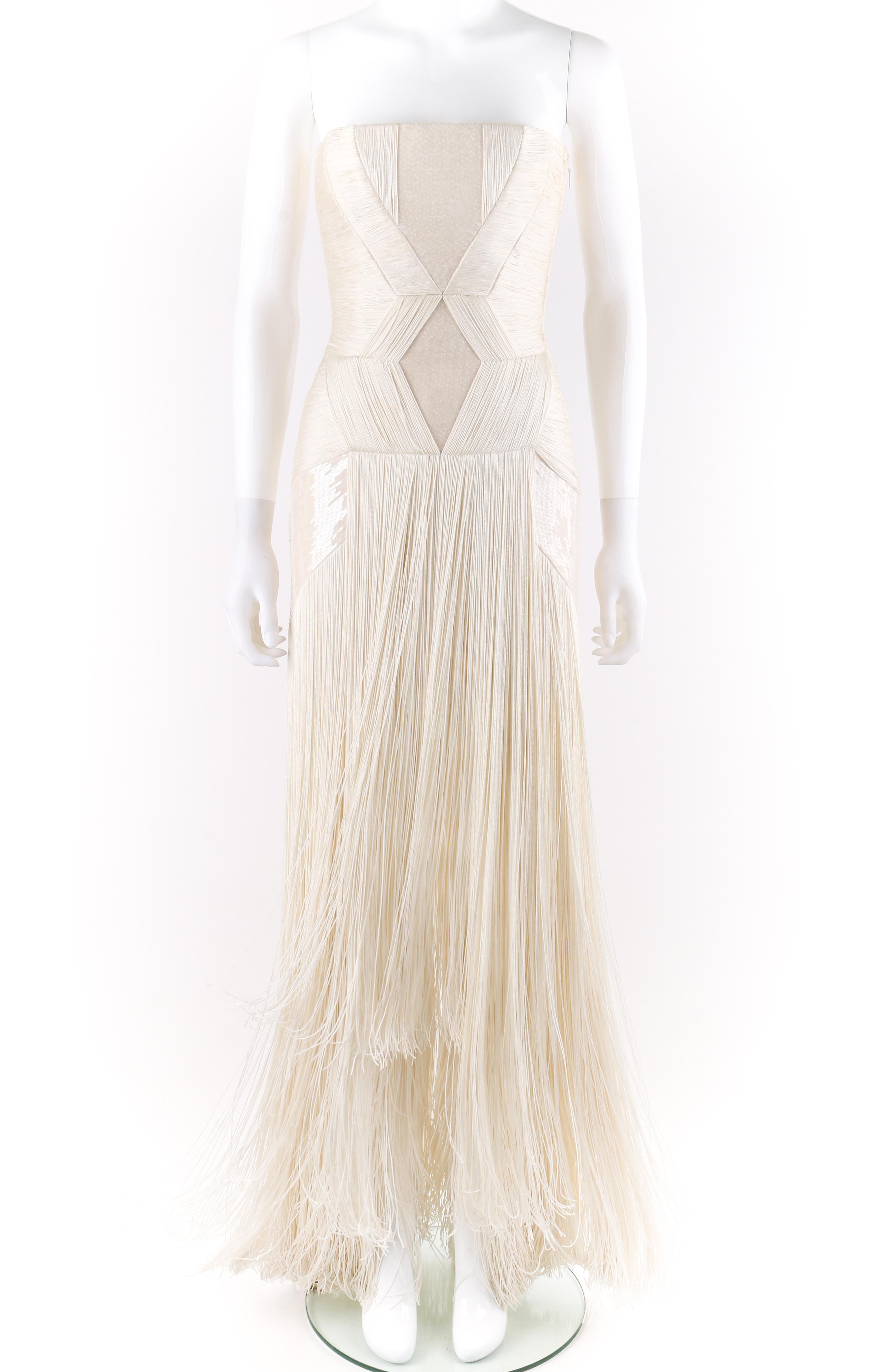 DESCRIPTION: Atelier VERSACE S/S 2011 White Sequin Embellished Fringe Art Deco Evening Gown
 
Brand / Manufacturer: Versace
Collection: Atelier; Spring / Summer 2011 Runway Look #46
Designer: Donatella Versace
Style: Evening gown
Color(s): Shades of