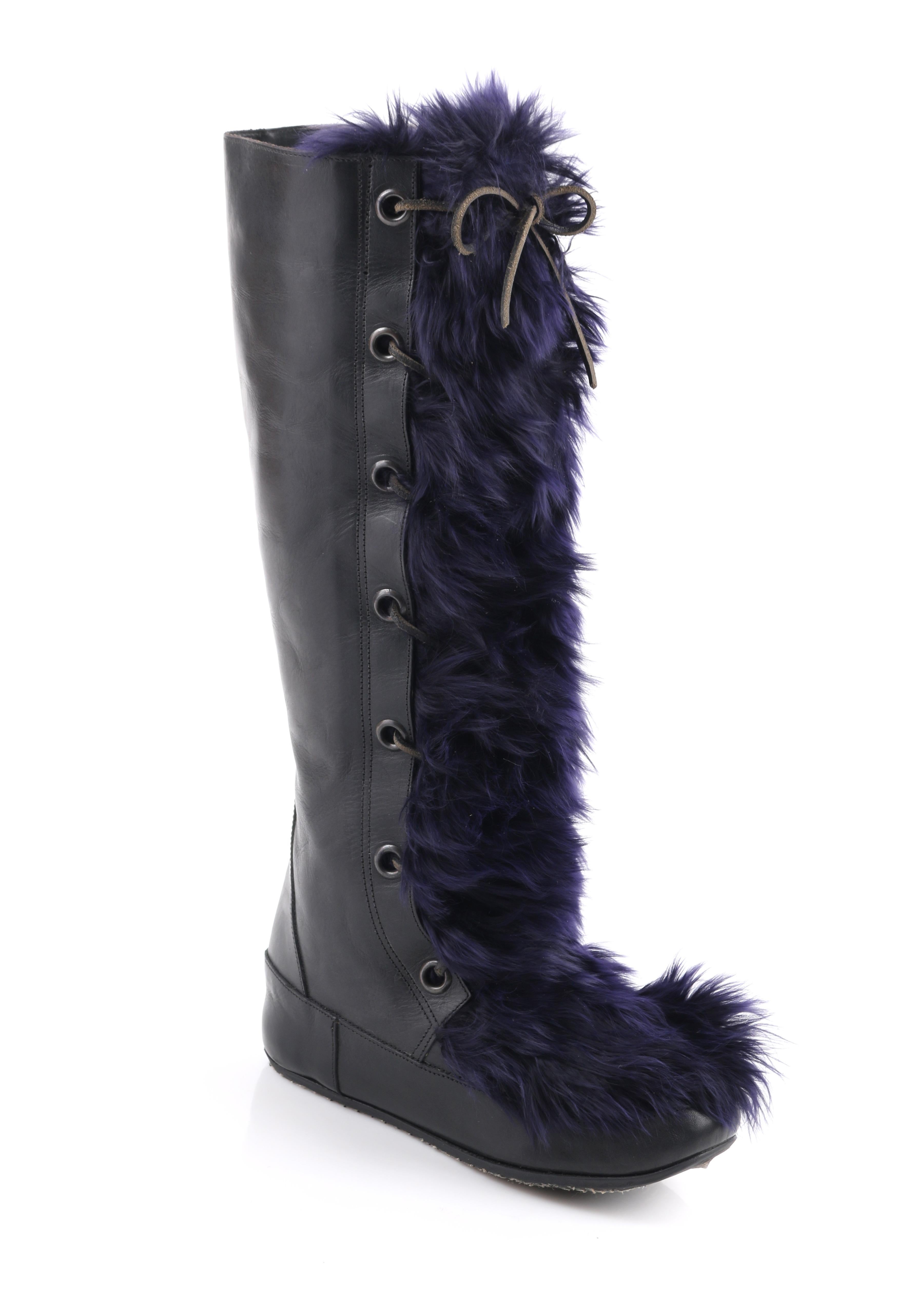 DESCRIPTION: Marni Black Leather & Navy Blue Angora Fur Lace Up Knee-High Apres Boots
 
Estimated Retail: $1330
 
Brand / Manufacturer: Marni
Style: Knee-high boots
Color(s): Shades of black and navy blue
Marked Materials: Upper: Leather; Lining: