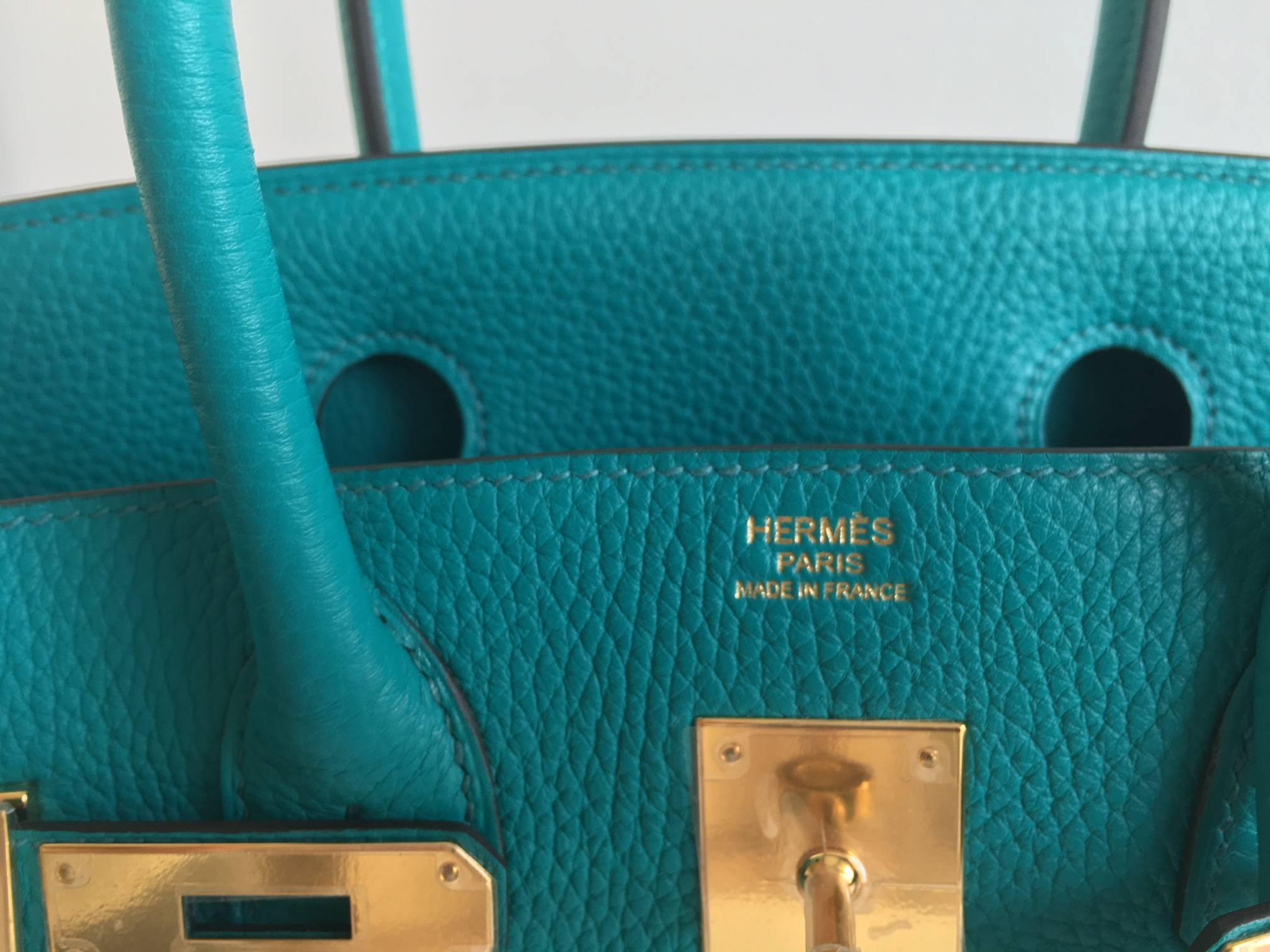 Hermès Paon blue Birkin 30 cm handbag. In the new Paon (peacock) blue color and Clemency leather. The hardware is gold. Stitching in matching Paon color. The bag come with the original box, dust bag and accouterments. Date stamp X for