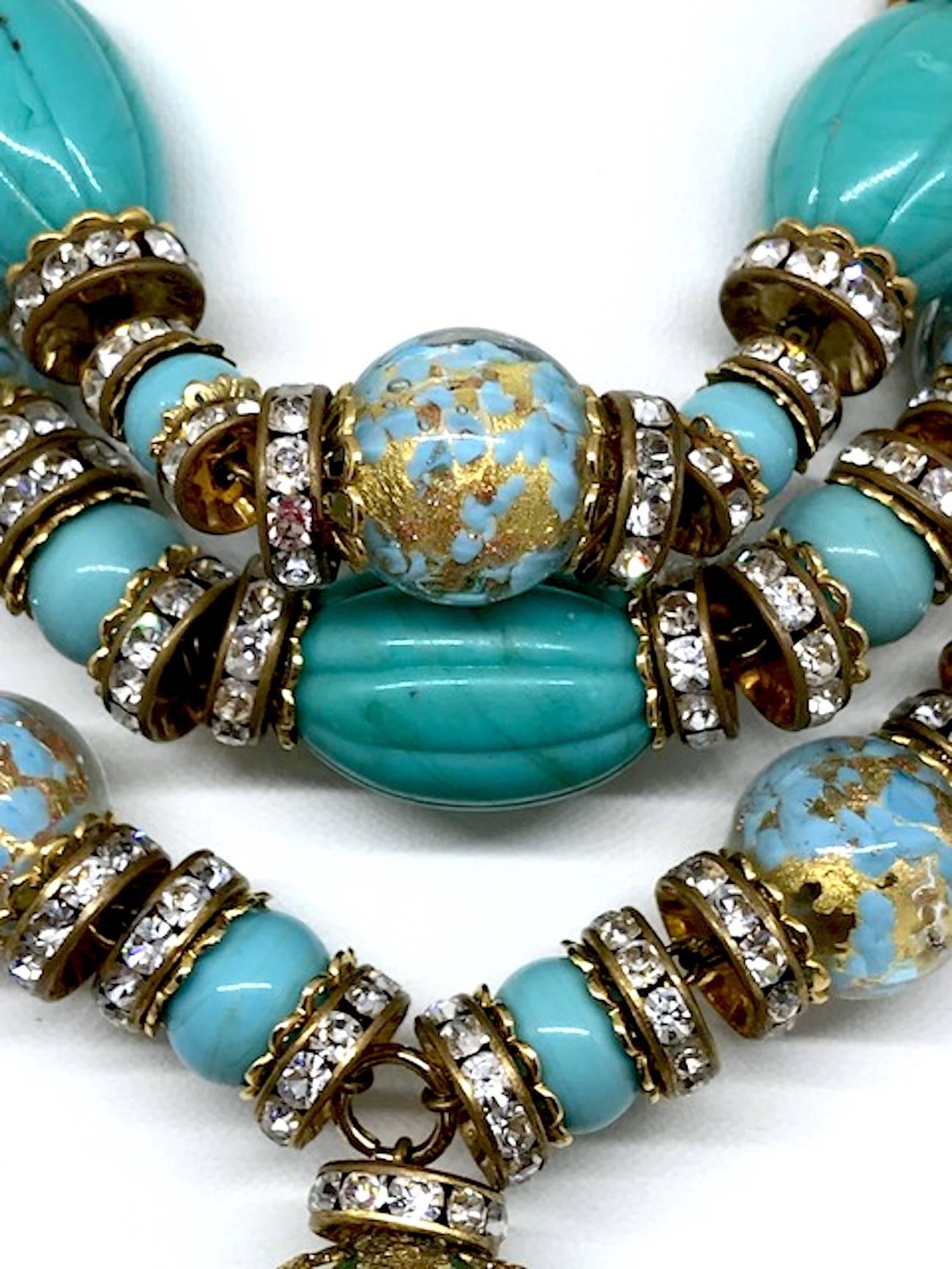A true statement necklace is this three strand Venetian glass bead and rhinestone rondelle chocker necklace from the 1980s. Attributed to De Liguoro Jewelry. Part of the large collection of jewelry from this company owned by Elsa Martinelli. Large