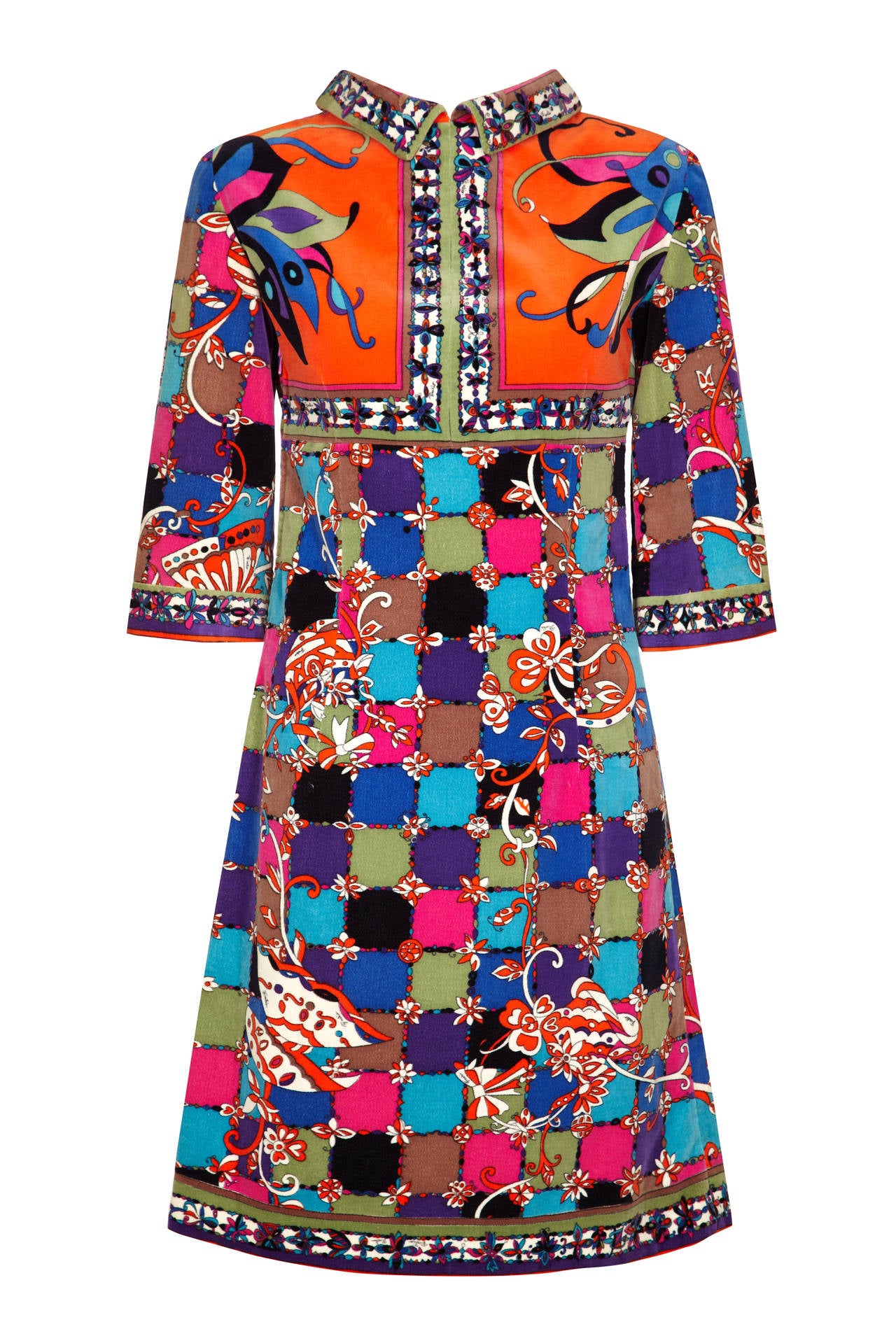 Amazing original 1960s velvet tunic dress by Emilio Pucci with empire line, ¾ sleeves and exceptional print.  This A-line dress features a zip from the collar to the empire line which can be worn open or closed and it fastens with another zip at the