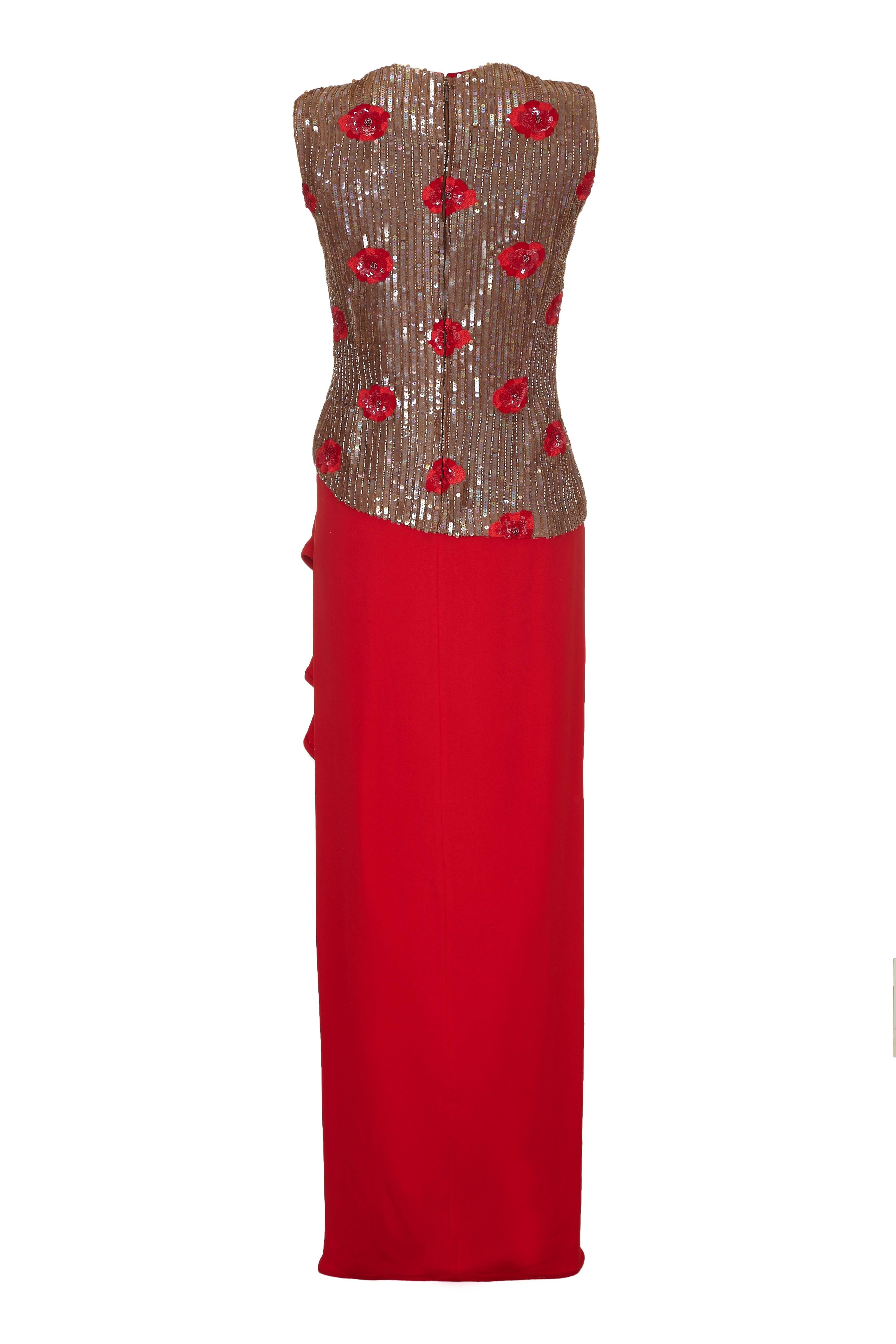 Fabulous vintage haute couture 1970s red dress by Italian designer Andre Laug.  This dress features a sequinned bodice with pretty embroidered red flowers and a wrap over fine crepe skirt with a ruffle front opening.  Beautifully made and in