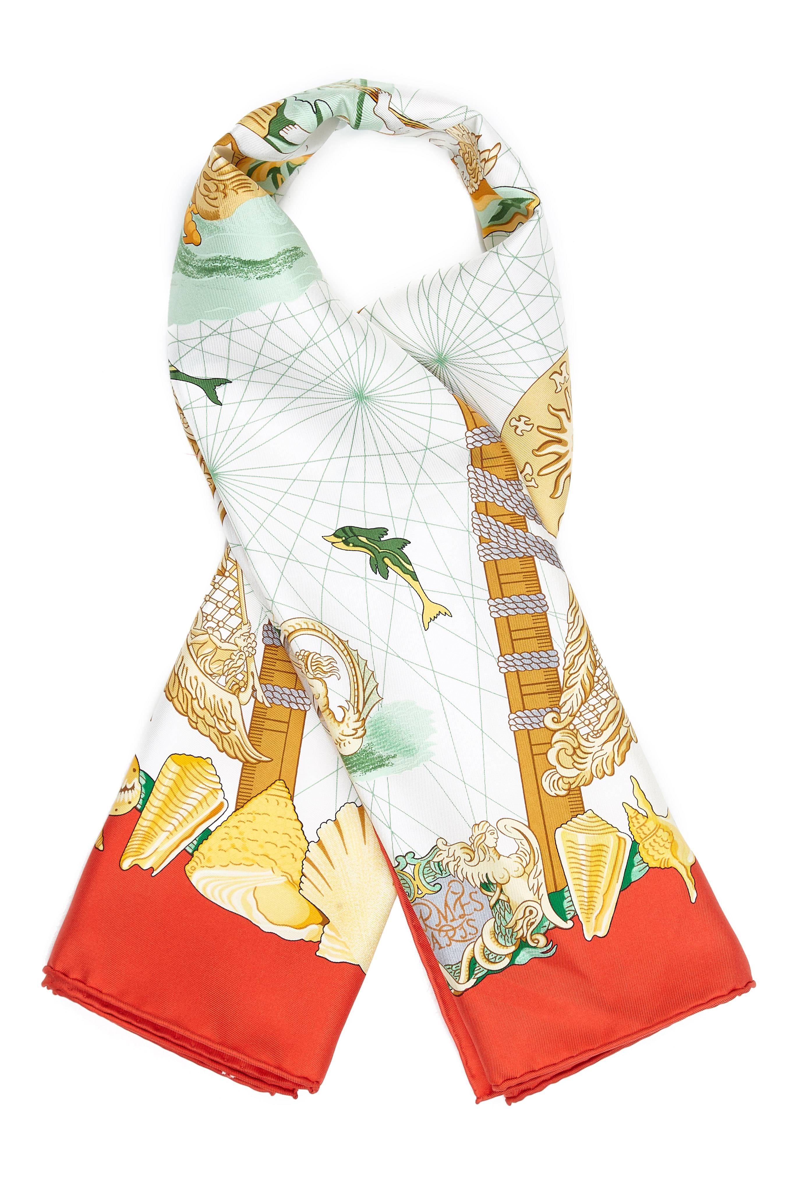 Balade Oceane vintage Hermes silk twill scarf designed by Julia Abadie and featuring a lovely ocean themed design in white, red, green and gold.  This is dated to 1999, the first and only issue of this scarf.  In excellent vintage crisp condition -