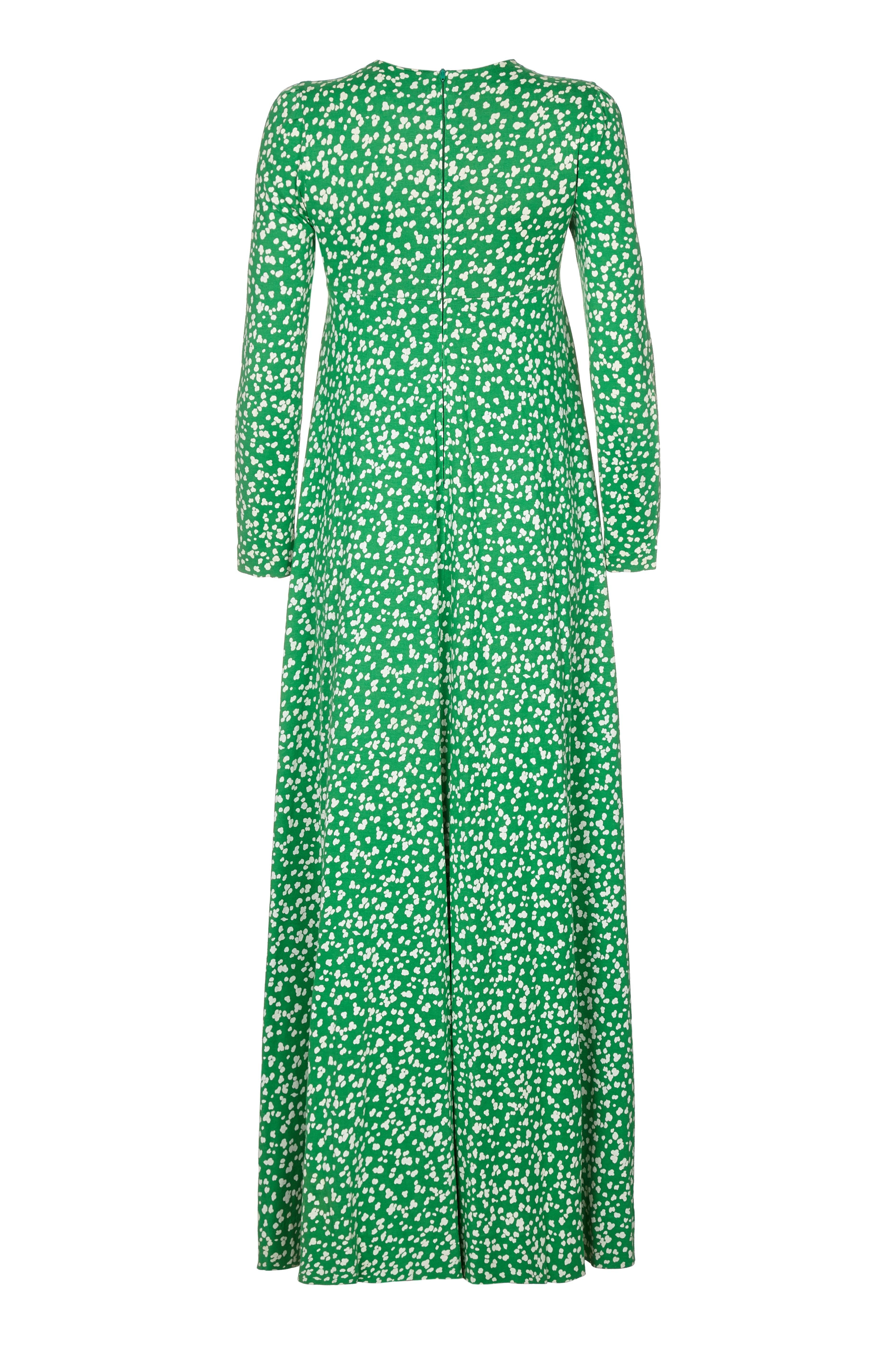 Diane von Furstenberg classic 1970s patterned green maxi dress made from a cotton rayon blend. Perfect for a summer garden party or can be dressed up for more of an evening look. The empire line waist which continues to trapeze throughout the length
