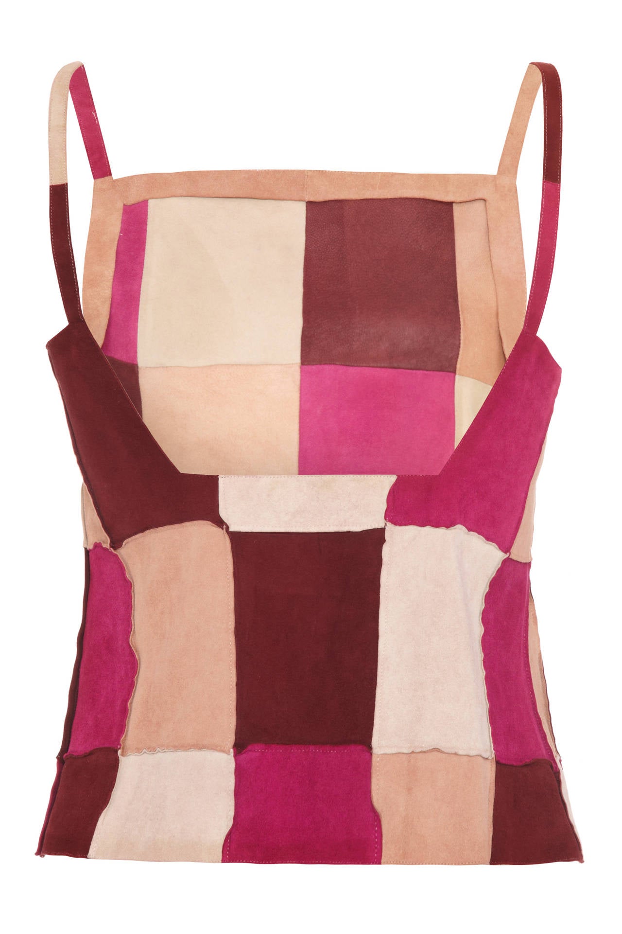 1970s inspired Chanel Identification 2000T suede patchwork tunic/vest top in colourful magenta, maroon, peach and beige.  This piece features a square cut low back, side zip fastening and is labelled size 38. 100% suede goat skin and in excellent
