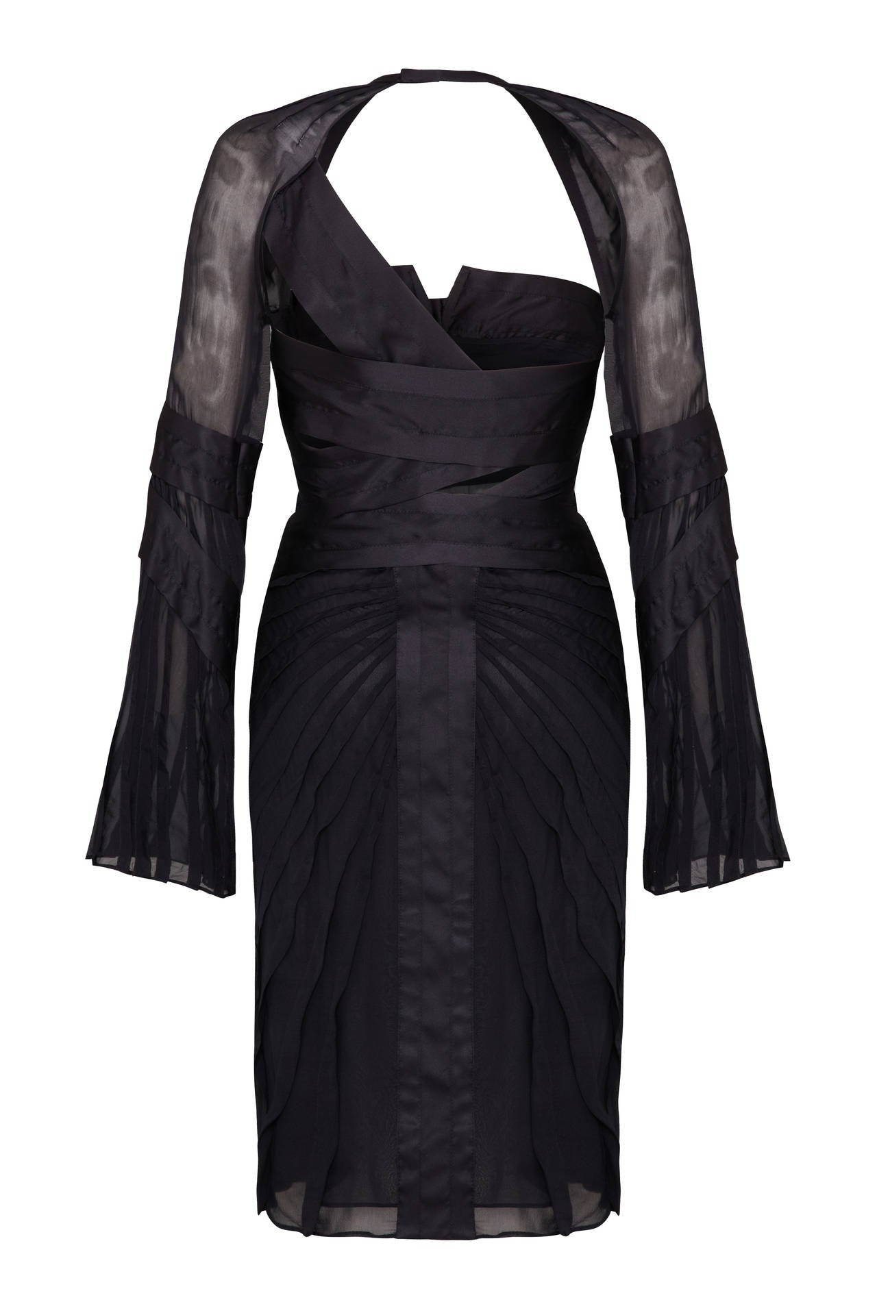 Black pleated chiffon and silk dress from Tom Fords last ever collection for Gucci A/W 2004-5. Labelled a size 38 which is a US 2, UK 6. In excellent condition and has never been worn, comes with original tags still attached.