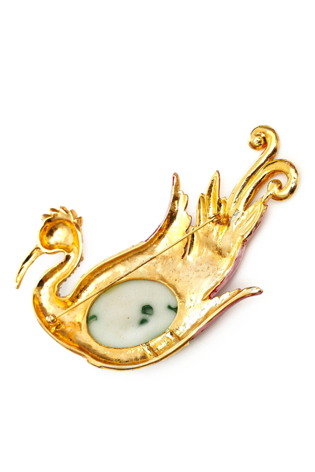 This magnificent vintage Crown Trifari swan brooch is a real show-stopper and a reproduction piece from the iconic and extremely rare Ming collection originally produced in the 1940s.  It is gold tone, painted in a variety of pinks with a central