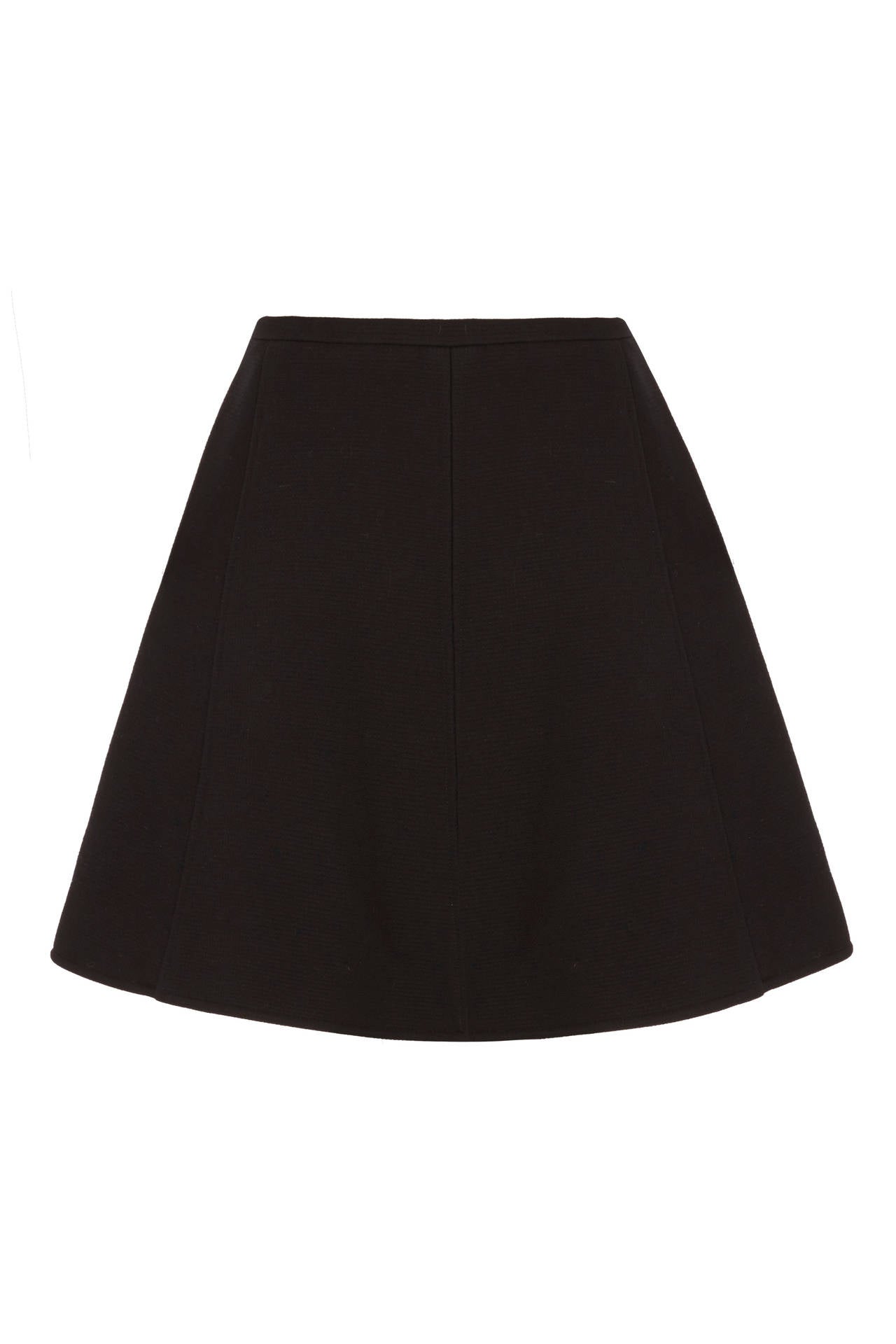 Fantastic 1960s black wool mini skirt by Courrege For Harrods.  This pieces features off centre fastening with gold buttons and a cute side pocket detail also with gold button to fasten.  It is fully lined in an ivory silk lining and is in excellent