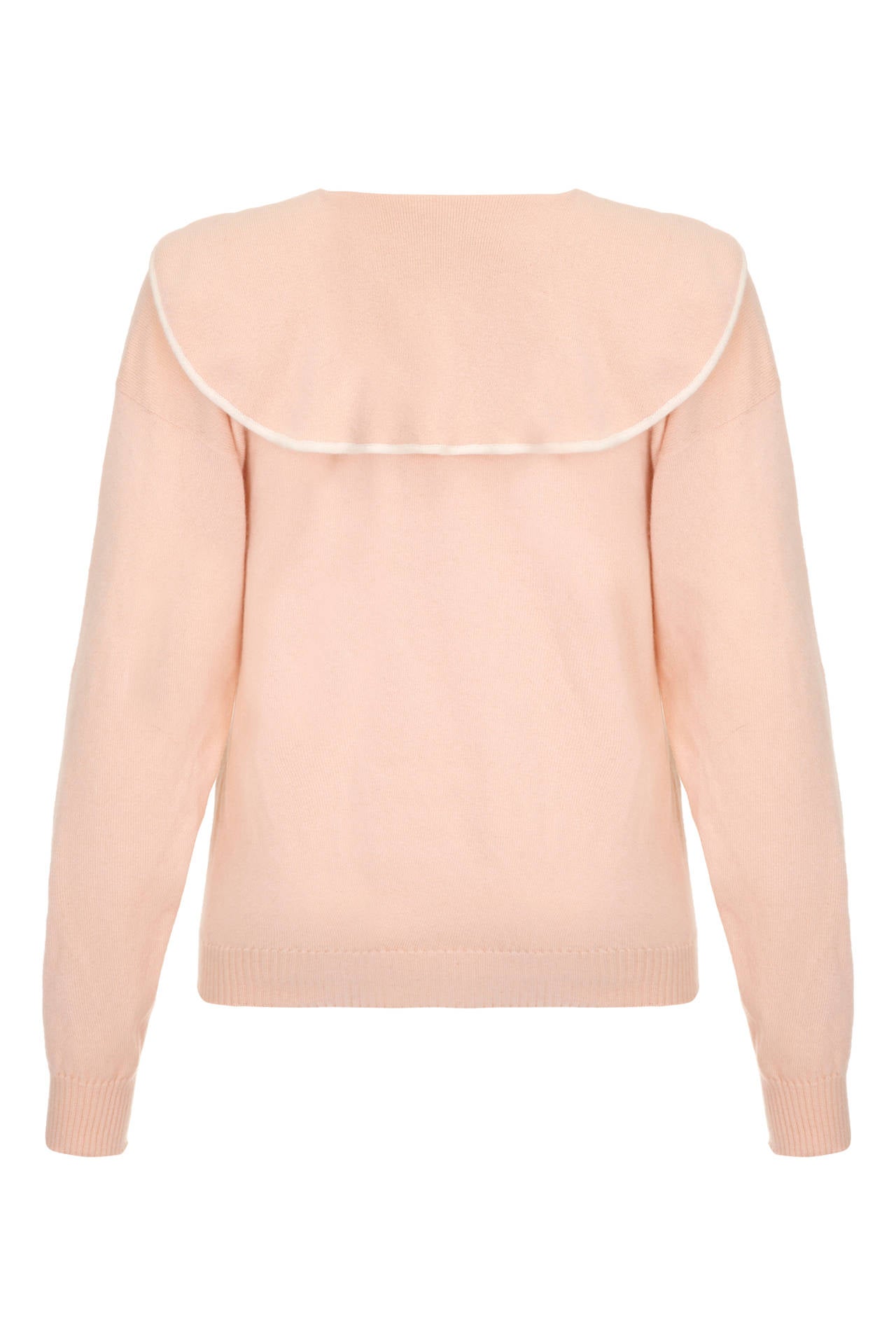 Super cute and unused 100% cashmere jumper in peachy pink with sailor collar and navy and white details include a bow at the centre front. Made in Scotland, very wearable and in excellent condition.