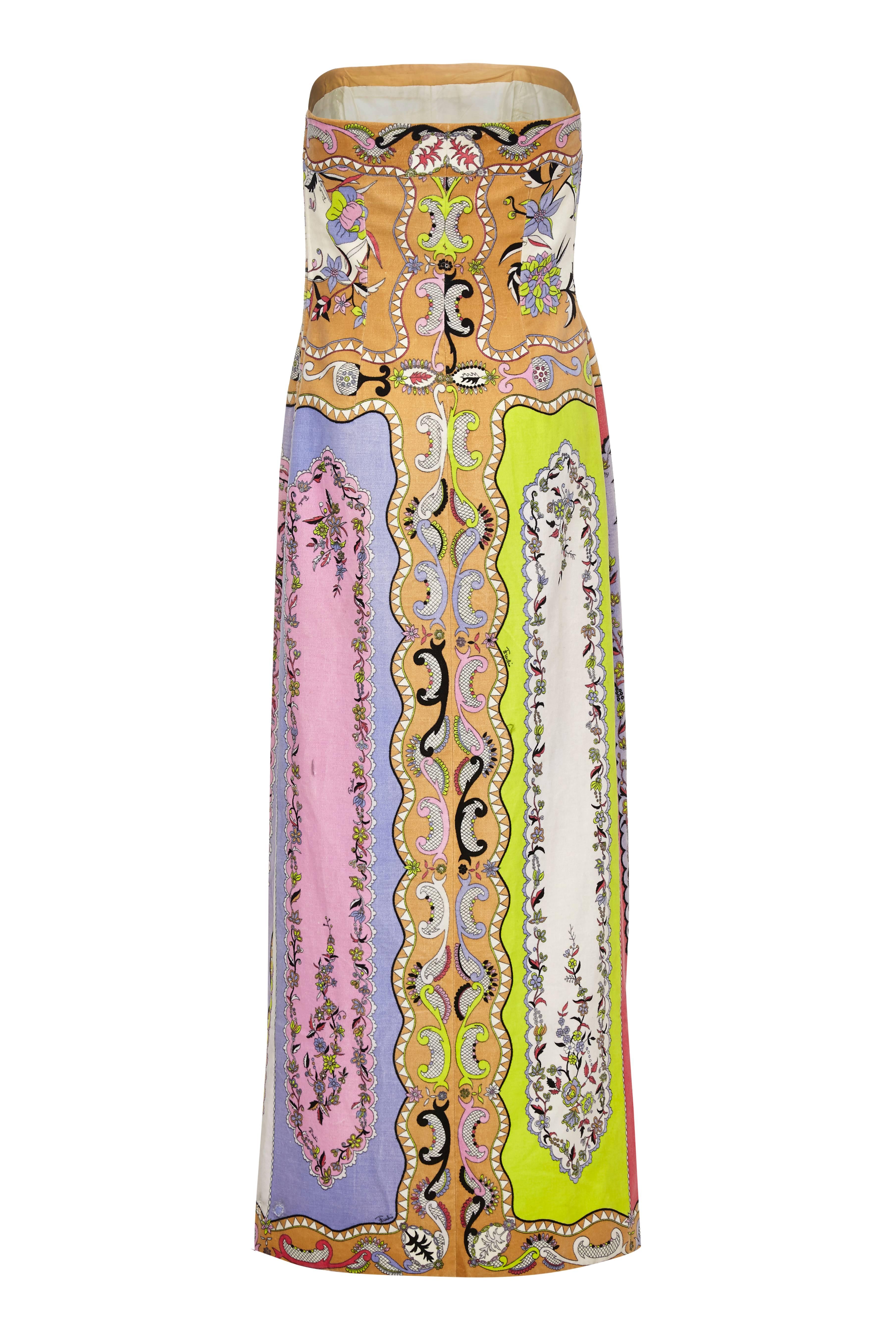 Fantastic vintage early 1970s Emilio Pucci velvet bustier dress with multi-coloured floral and panelled pattern.  This strapless gown is beautifully made with internal boning for support and a zip fastening at the side. A rare collectors item in