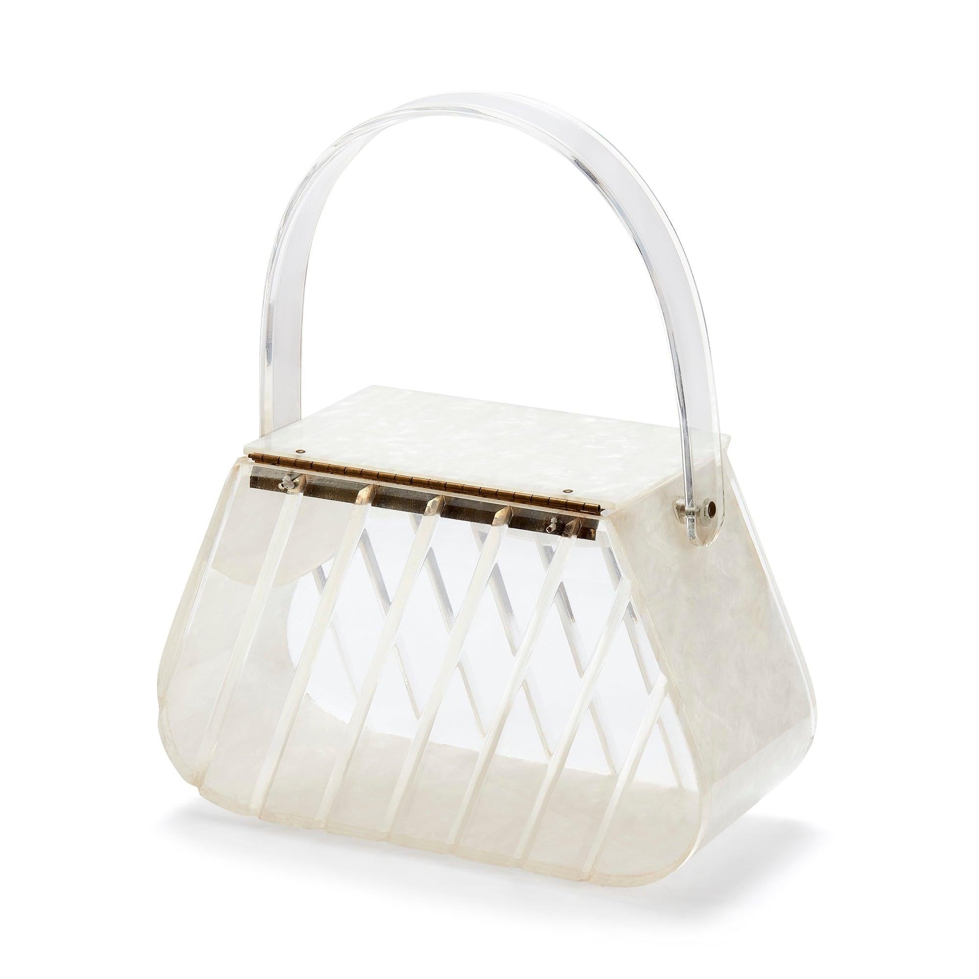This eye catching clear and pearlescent lucite bag was made in the 1950s. A trapeze design is one of the more desirable shapes for collectors and although unlabelled, the quality suggests it was manufactured by one of the greats - Charles S Khan,