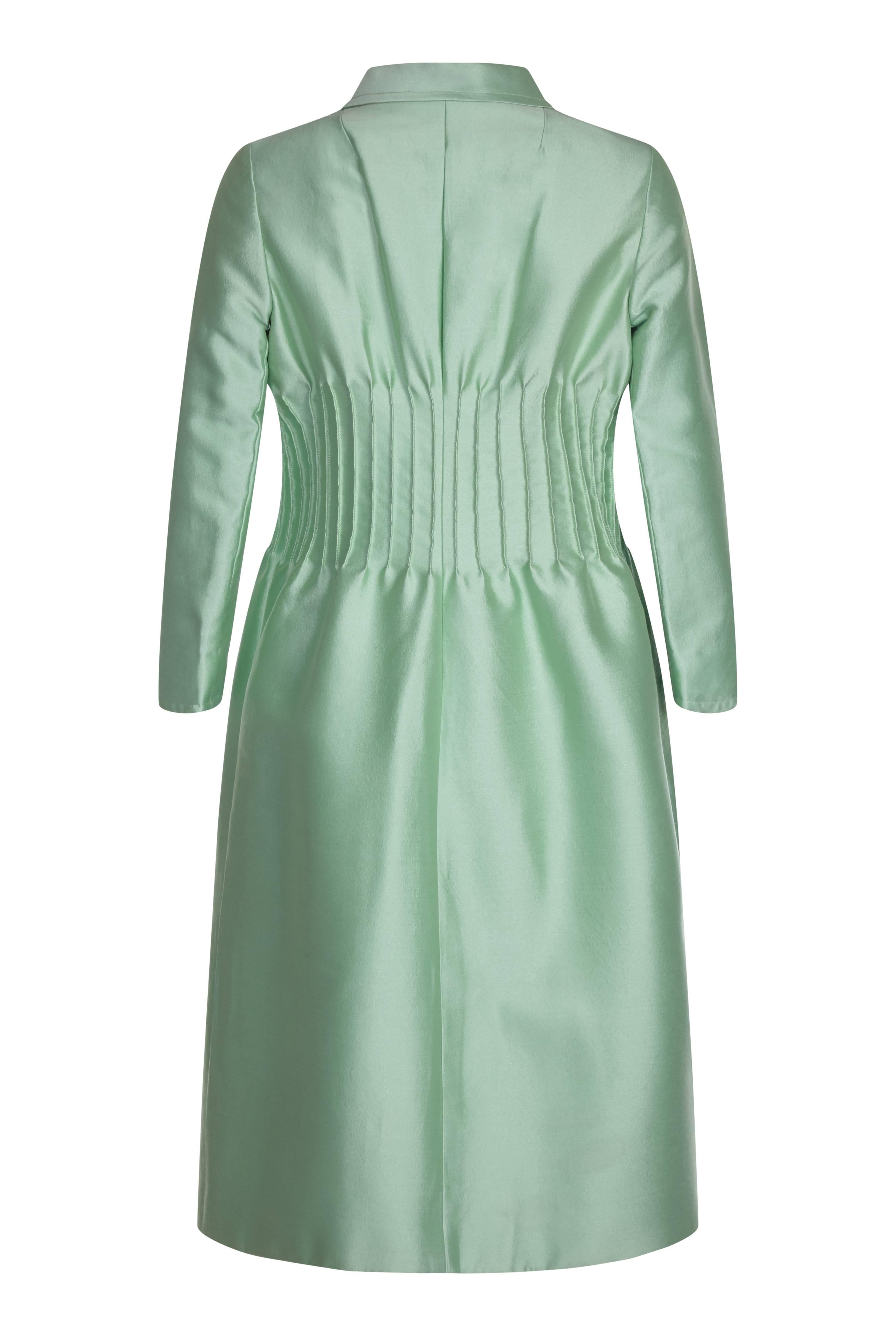 Chic 1968 Valentino vintage silk dress suit in seafoam green in exceptional, museum quality condition. Part of a diffusion collection for British department store Debenhams and Freebody, this set echoes the sophisticated tailoring of the designer's