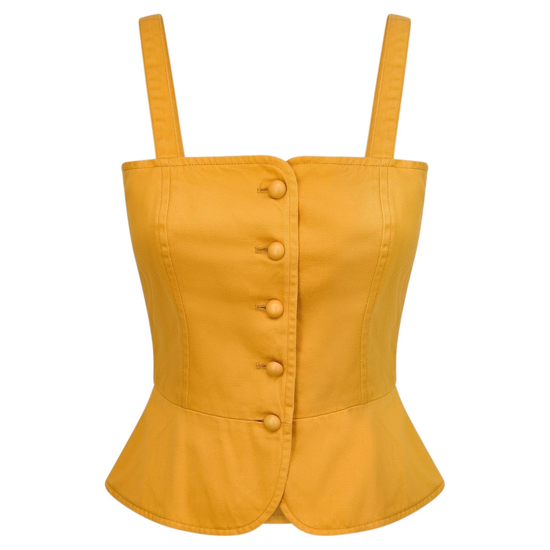 Top a corsetto in cotone giallo Yves Saint Laurent, presentato in passerella nel 1980 in vendita