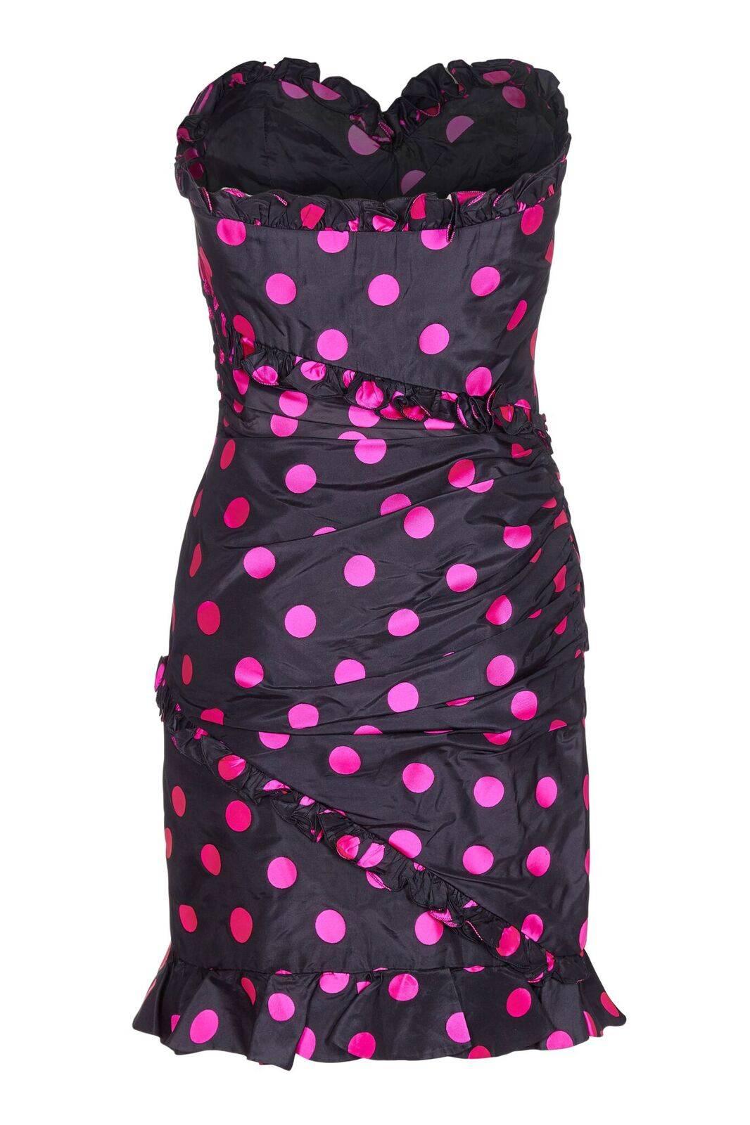 This fantastic Emanuel Ungaro 1980's silk taffeta polka dot off-shoulder cocktail dress is guaranteed to turn heads! A superb example of the innovative tailoring and youthful flare synonymous with its designer, the dress has wonderful construction