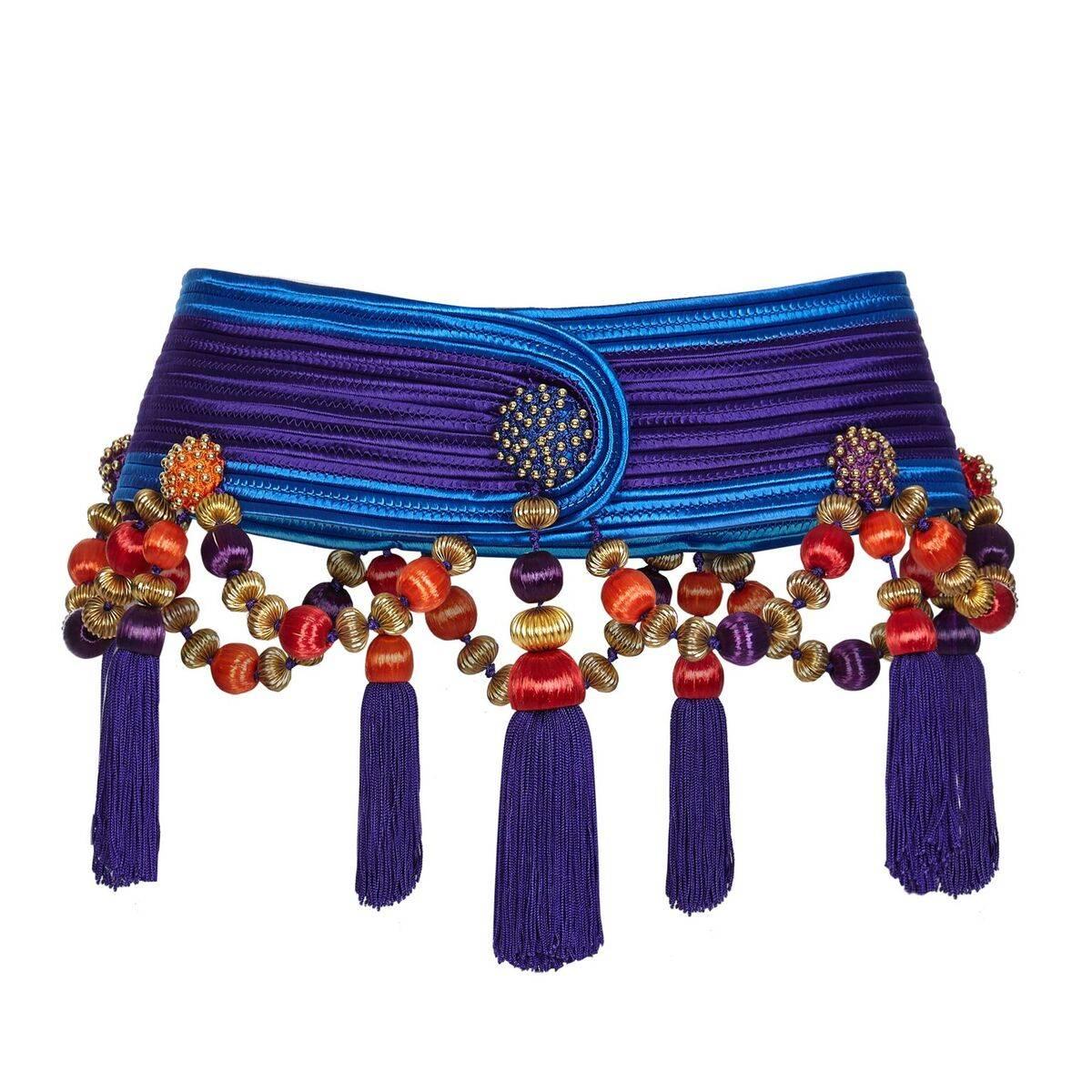 This spectacular Yves Saint Laurent vintage purple woven tassel statement belt is from the 1991 Rive Gauche collection. Constructed in a silk cotton weave, the belt is  3.2 