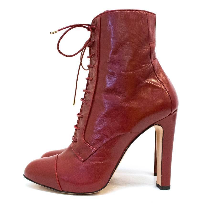 Bionda Castana red lace up boots with a chunky heel, stitch detailing and side zip closure.

Some very minor signs of wear to the sole from wear in a fashion show (please see image 9).

Made in Italy.

Condition: 9.5/10

APPROX MEASUREMENTS: