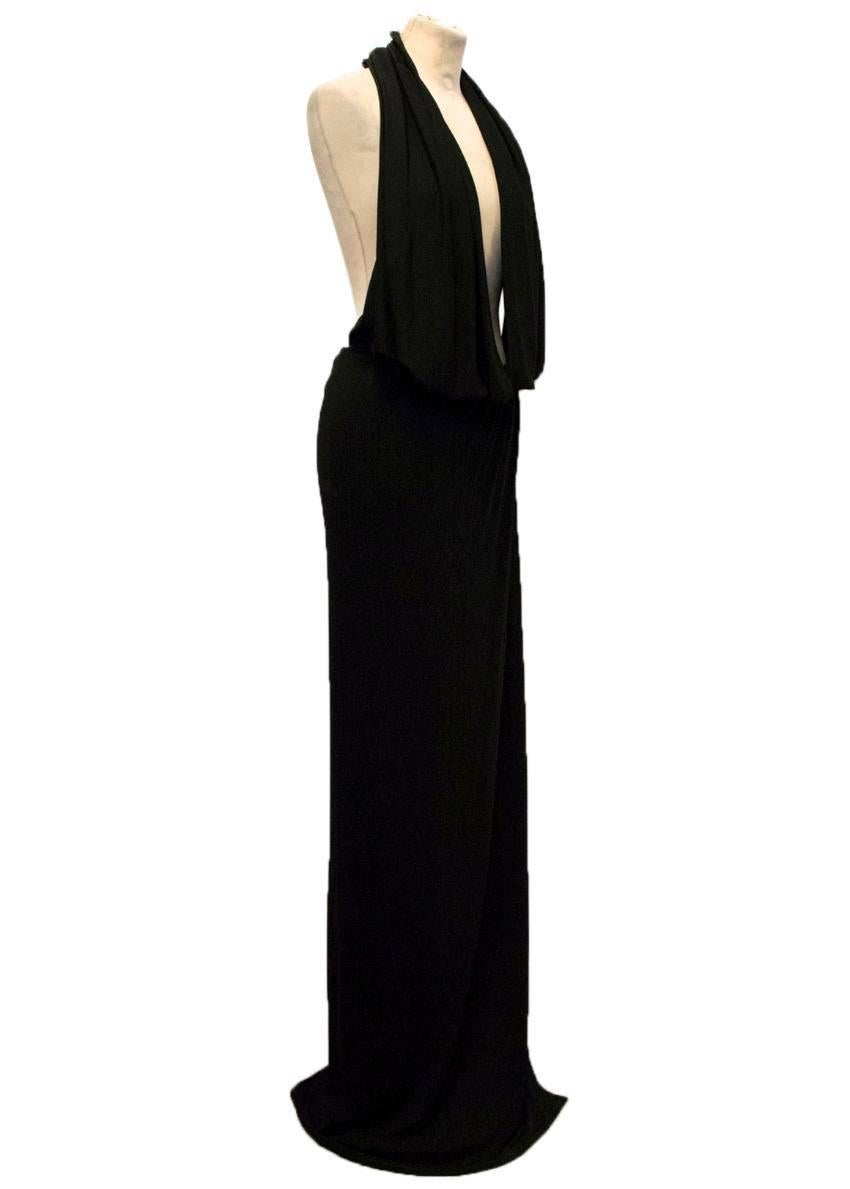 Osman black extreme plunge halter neck maxi dress with elasticated waist.

Made in England.

Condition: 10/10

Measurements Approx:
Waist: 34cm
Length: 190cm

Size 10-  Please kindly note size is an approximation based on measurements.